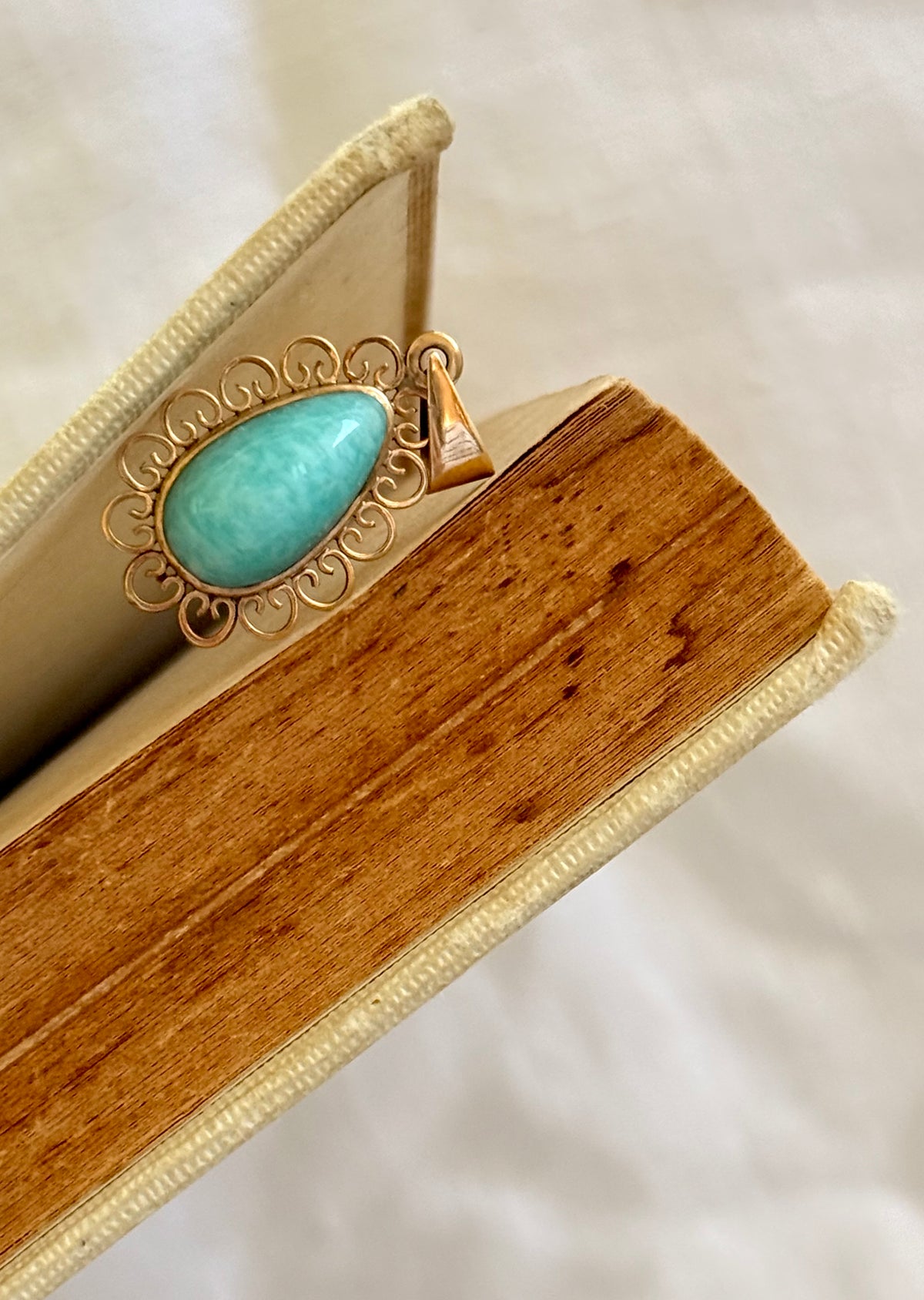 .1940s .1950s .375 .9ct gold Amazonite vintage yellow gold modernist teardrop pear shaped filigree scroll form frame blue green gemstone drop pendant.