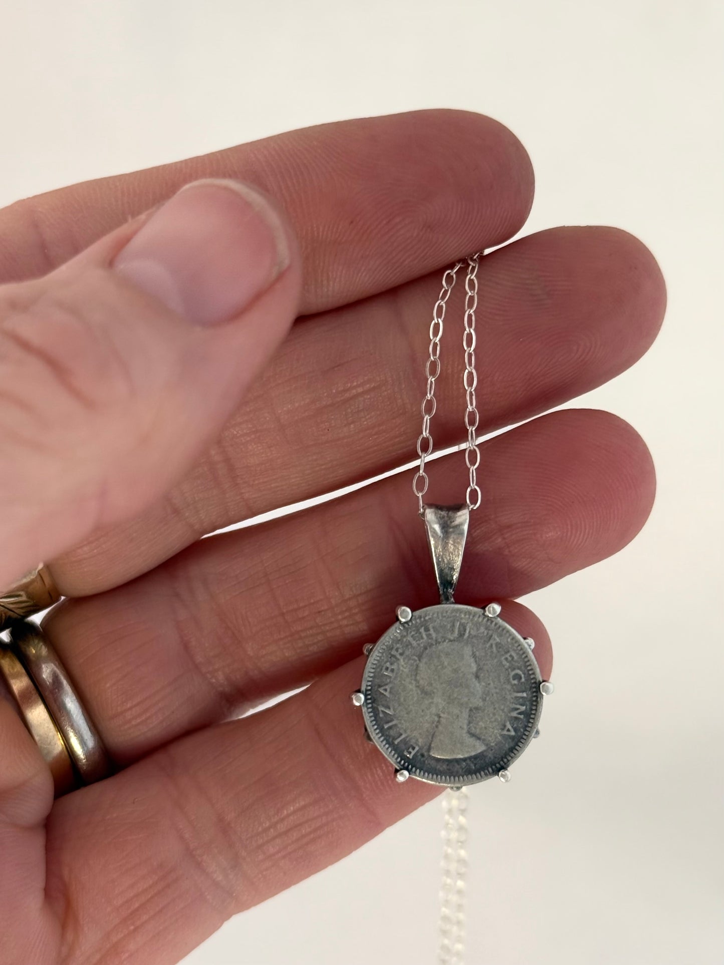.1954 .3 pence .500 silver Queen Elizabeth II South African coin pendant set in .925 silver on silver chain necklace