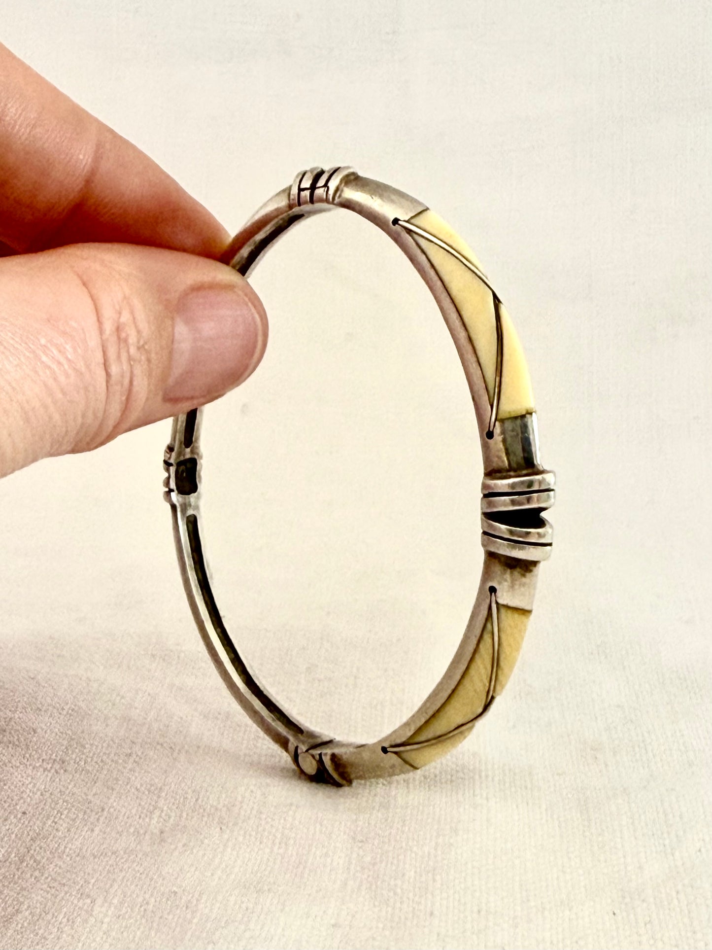 .1940s .1950s .925 modernist silver and ivory inlay tribal style MCM designer clasp bangle