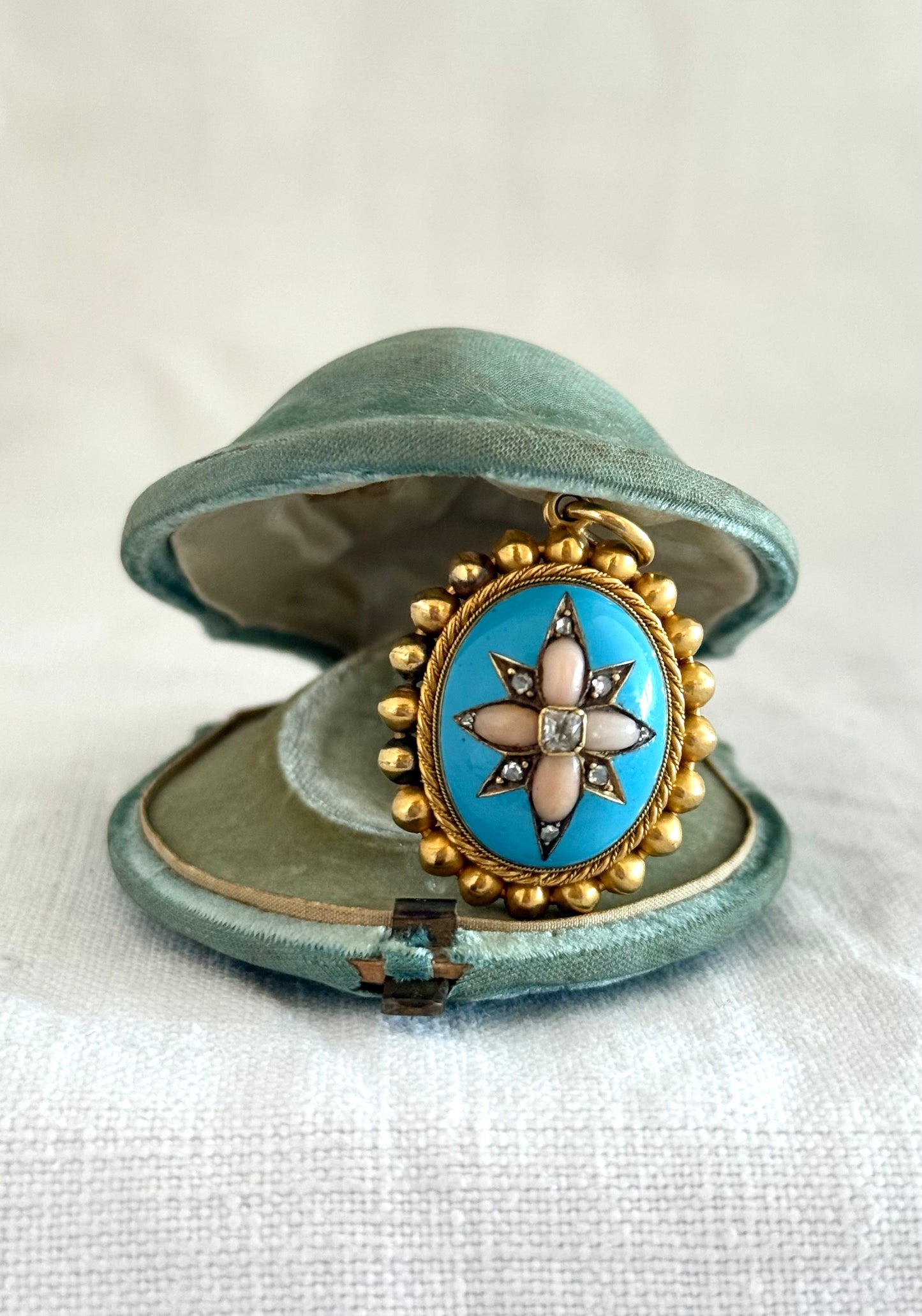 .15ct .1850s .1860s antique Victorian Yellow Gold Cushion cut Diamond Rose Cut Diamond star starburst Angel Coral and Blue Enamel Etruscan Revival Beaded border Mourning locket pendant