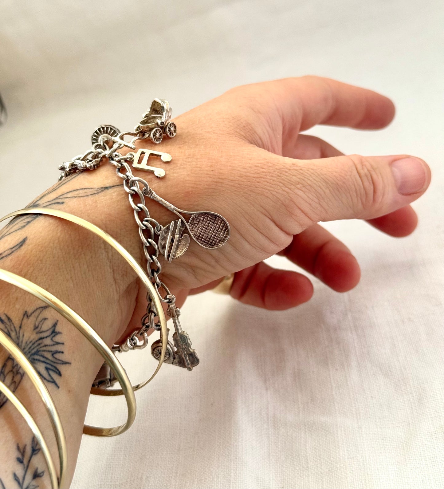 .14 charms .1970s .925 dangly keepsake charm bracelet