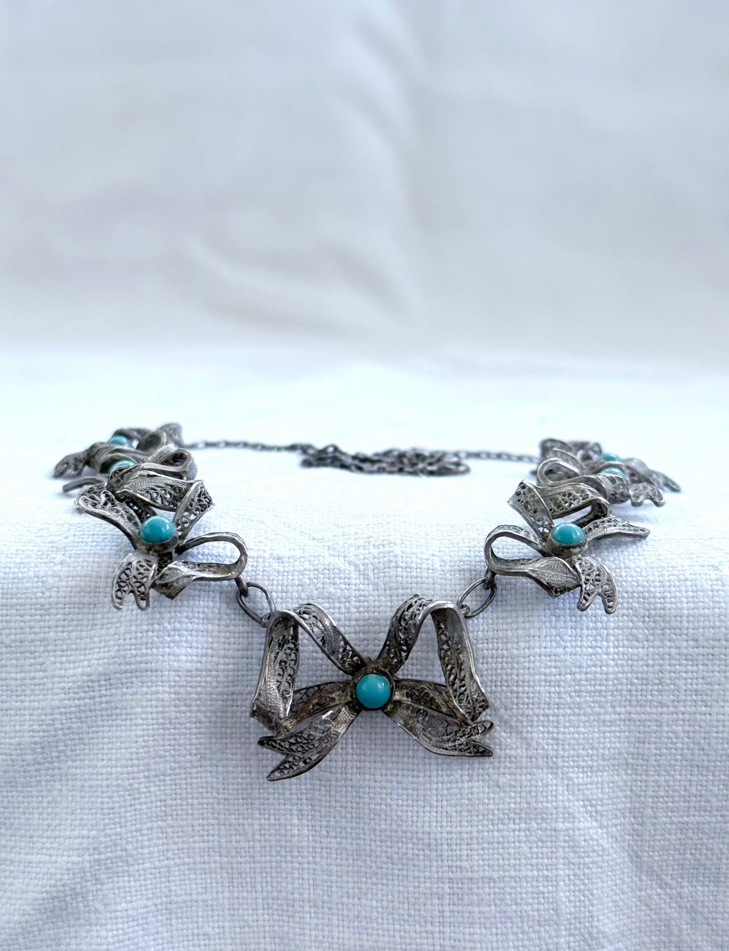 .1900s .1930s .916 silver vintage open work filigree wirework Bow Ribbon chain necklace
