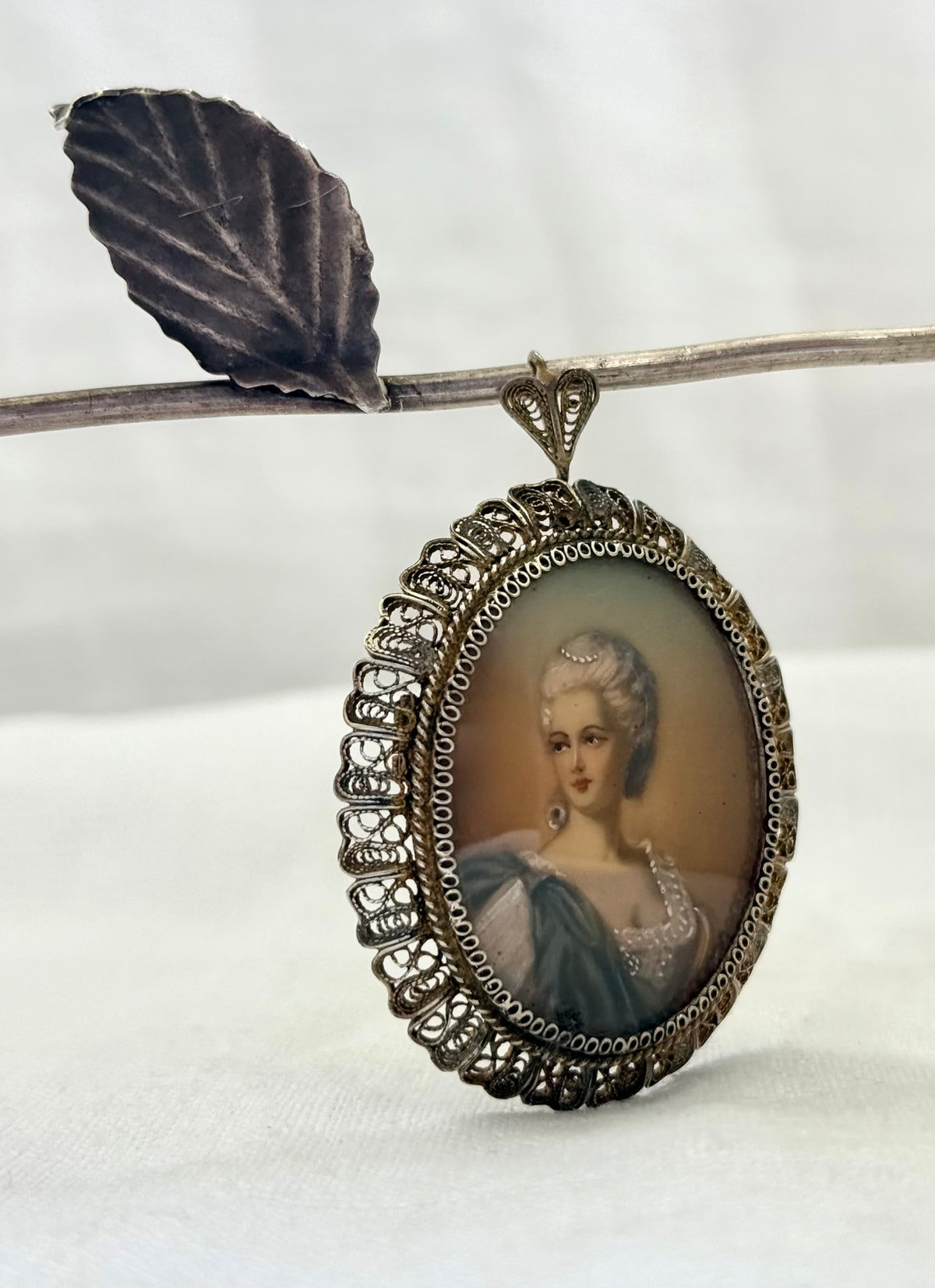 .1930s .1940s .800 Artist gold and silver incredible hand painted miniature Baroque revival portrait in fine silver filigree brooch and pendant
