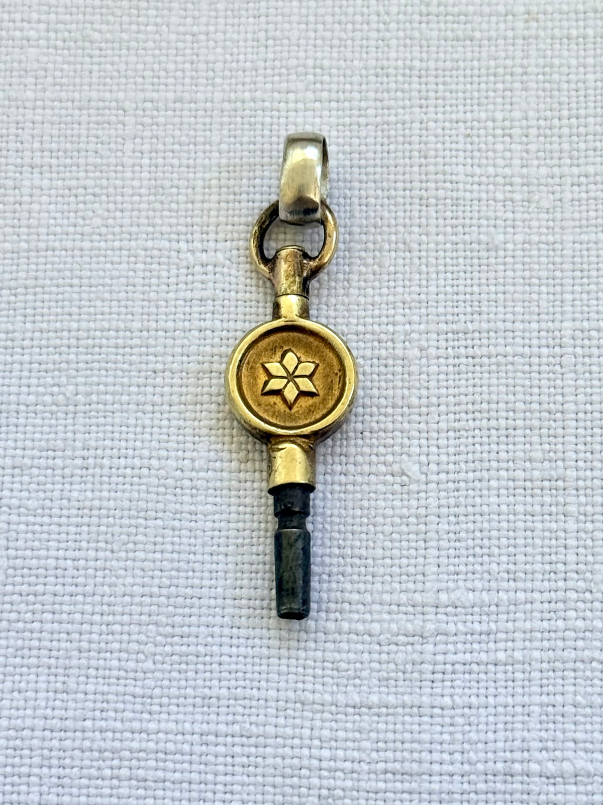 .1900s antique brass watch winder key number 4 collectors silver fob pendant