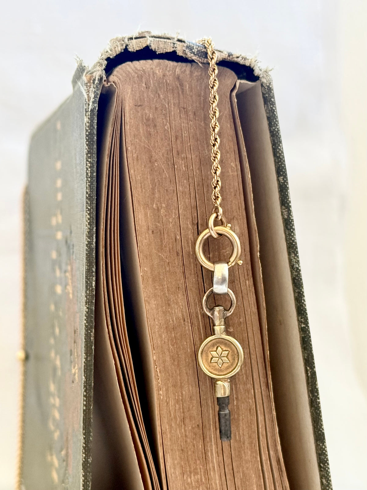 .1900s antique brass watch winder key number 4 collectors silver fob pendant