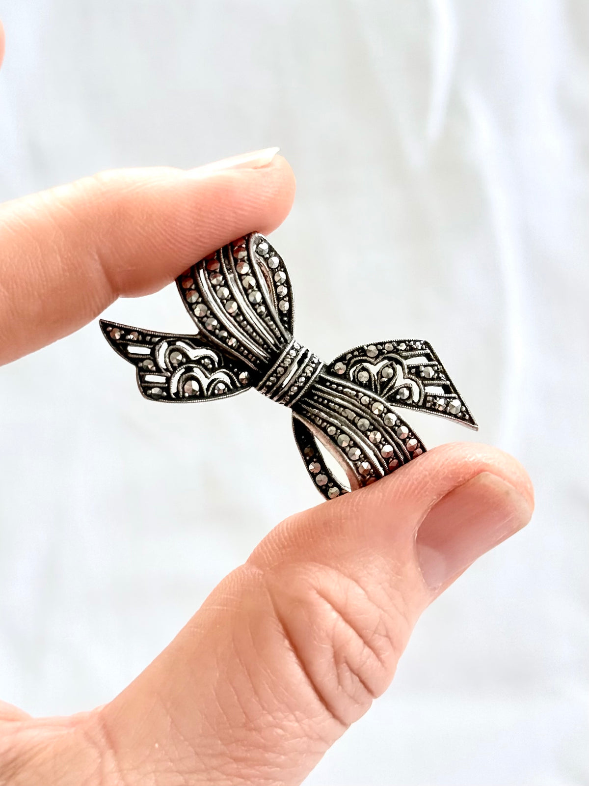 .1920s .1930s .800 Art Deco French Paris Bow Ribbon silver Marcasite gemstone sweetheart brooch