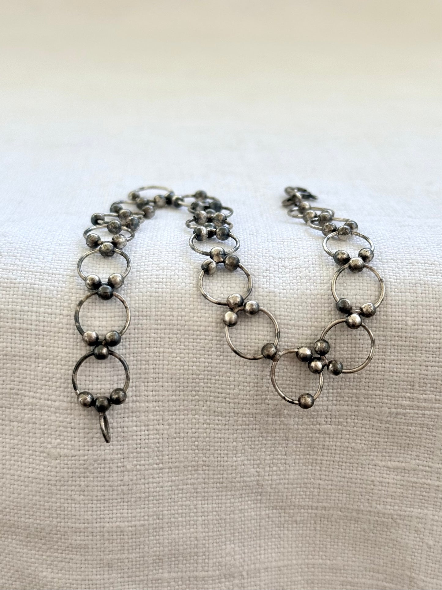 .21cm .925 articulated circular circle modernist silver link chain bracelet