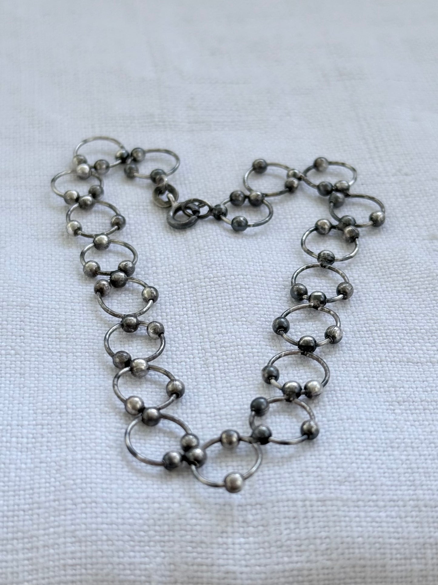 .21cm .925 articulated circular circle modernist silver link chain bracelet