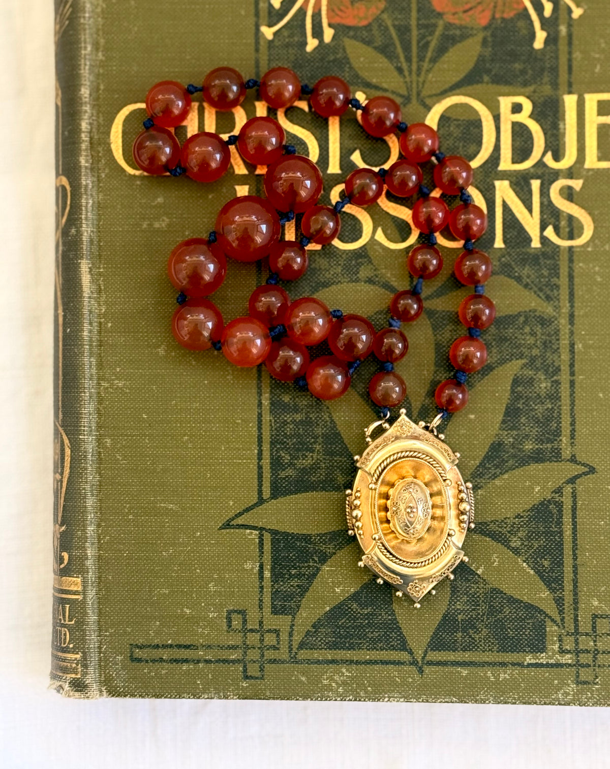 .1800s .375 .9ct gold Antique decorative fine Etruscan revival Victorian ornate gold oval pendant on luxury Carnelian bead graduated gemstone necklace setting