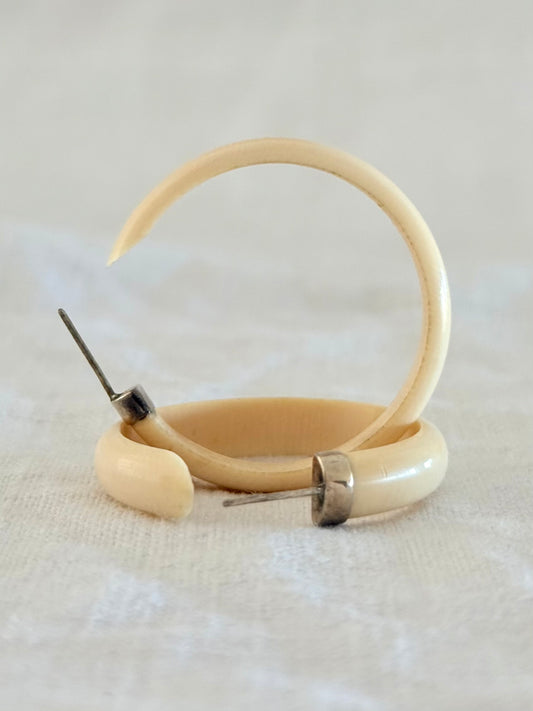 .1950s .1960s classic and gorgeous oversized pre ban Ivory hoop huggies capped in silver