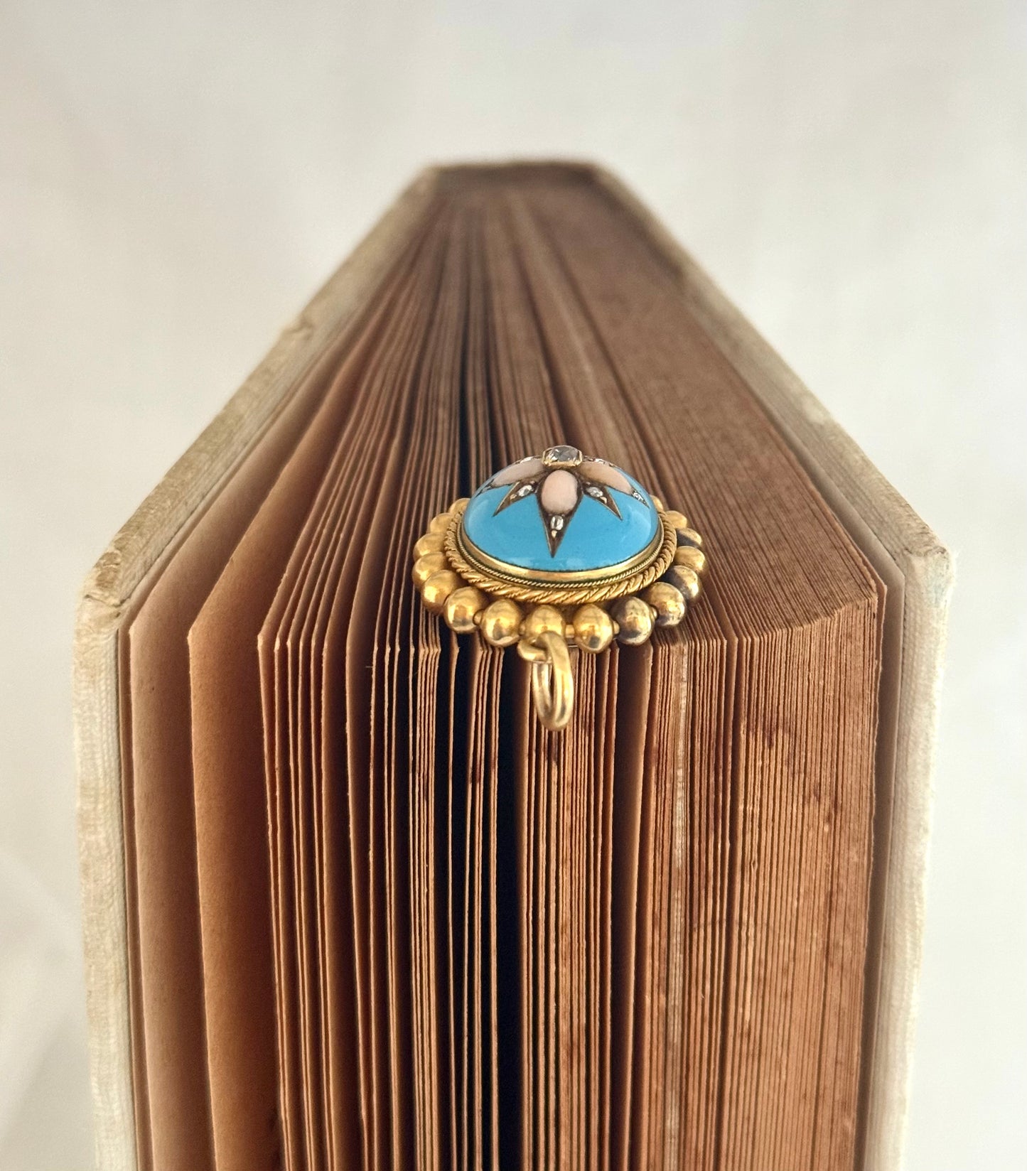 .15ct .1850s .1860s antique Victorian Yellow Gold Cushion cut Diamond Rose Cut Diamond star starburst Angel Coral and Blue Enamel Etruscan Revival Beaded border Mourning locket pendant