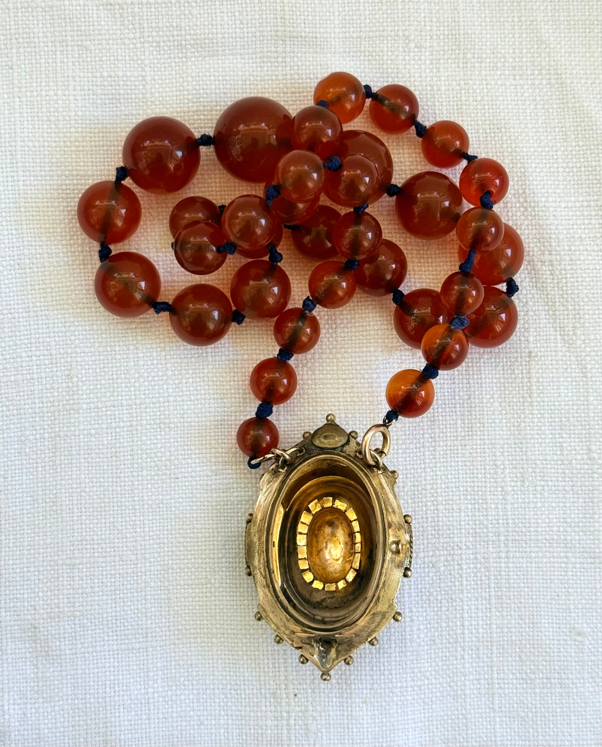 .1800s .375 .9ct gold Antique decorative fine Etruscan revival Victorian ornate gold oval pendant on luxury Carnelian bead graduated gemstone necklace setting