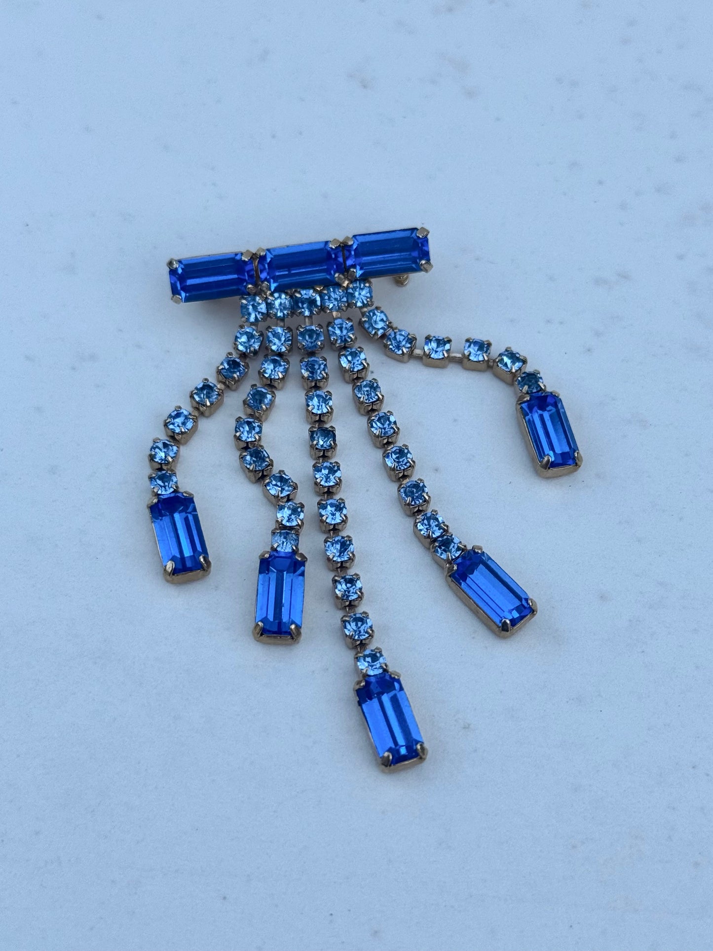 .1920s .1940s revival Art Deco style Blue Diamante paste waterfall dazzle costume brooch lapel pin