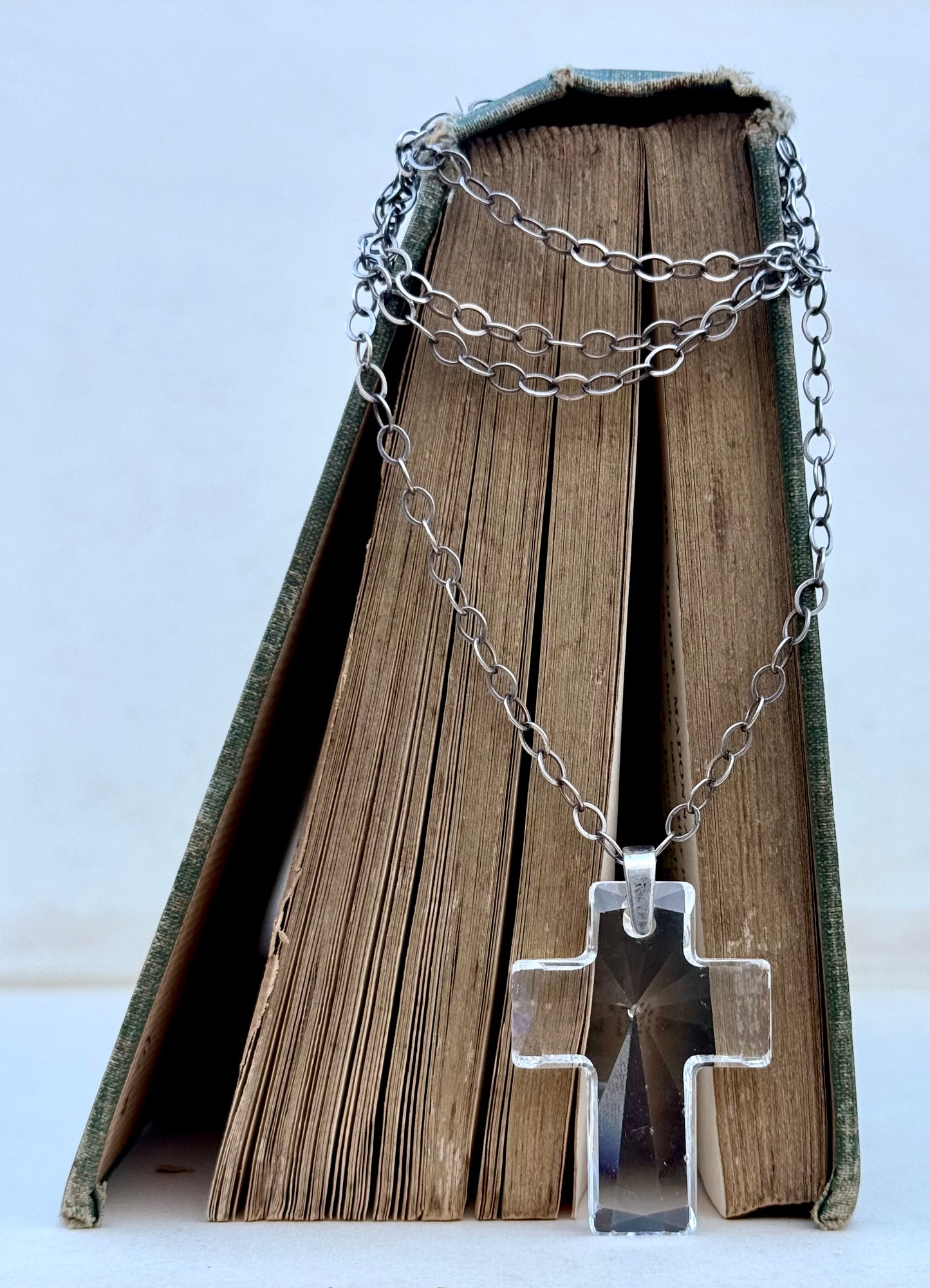 .925 .70cm long sterling silver modernist chain necklace with large faceted clear crystal glass cross pedant