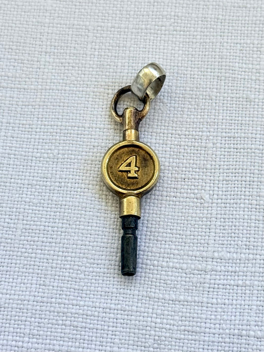 .1900s antique brass watch winder key number 4 collectors silver fob pendant
