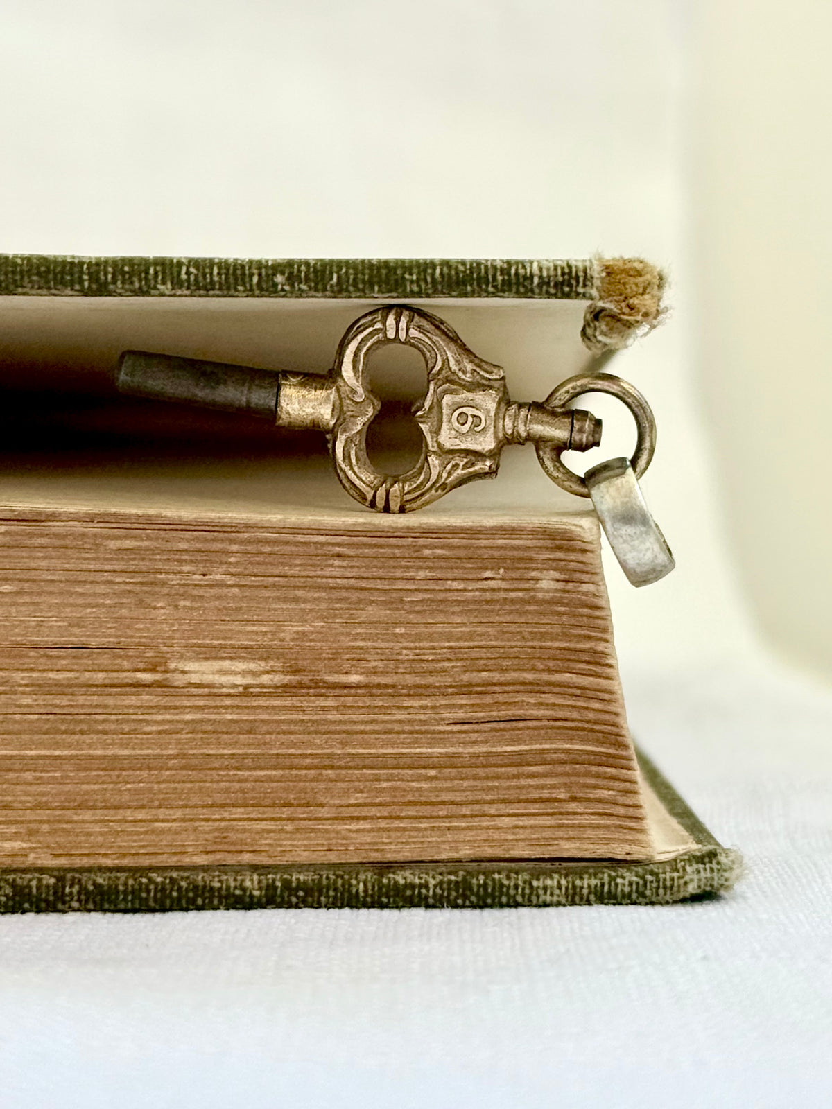 .1900s antique Art Nouveau brass watch winder key number 6 collectors silver fob pendant