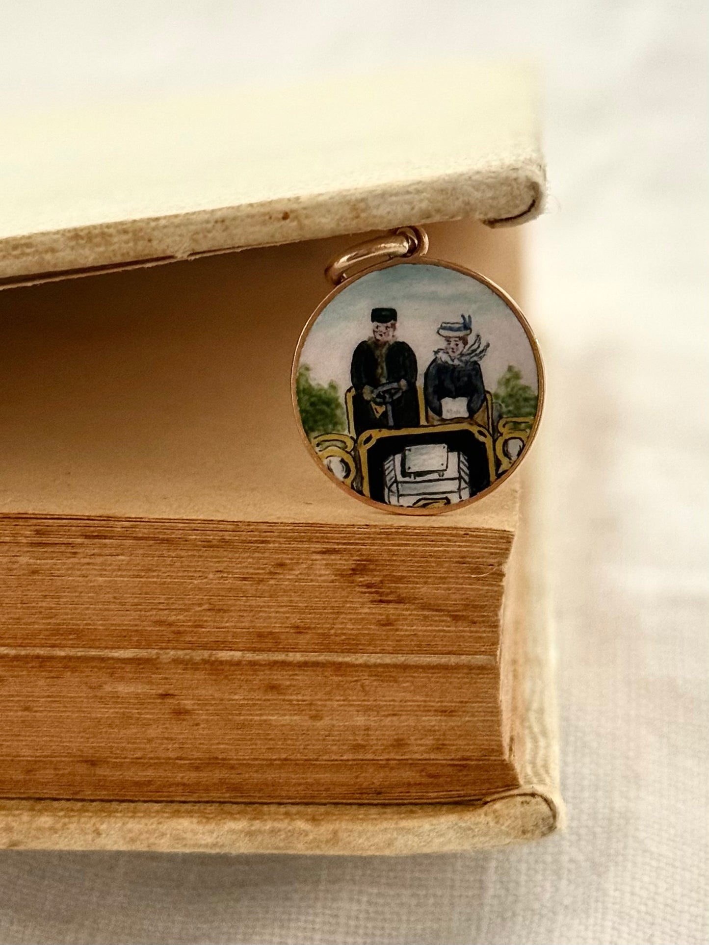.1900s .375 .9ct gold enamel afternoon drive car drive quirky scene finely painted enamel on gold pendant