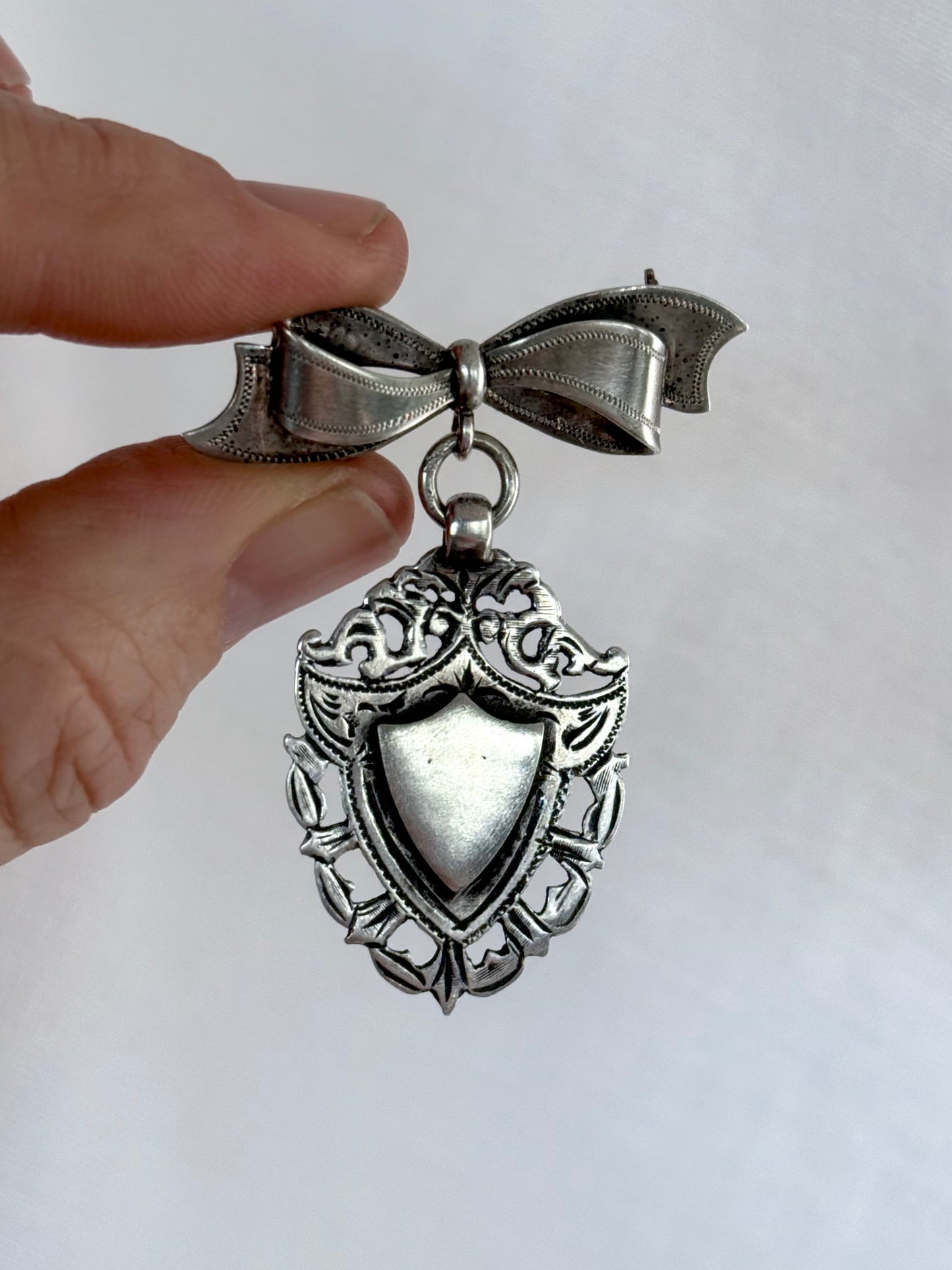 .1940s .1950s .925 Awards sterling silver Sweetheart bow and fob medallion brooch