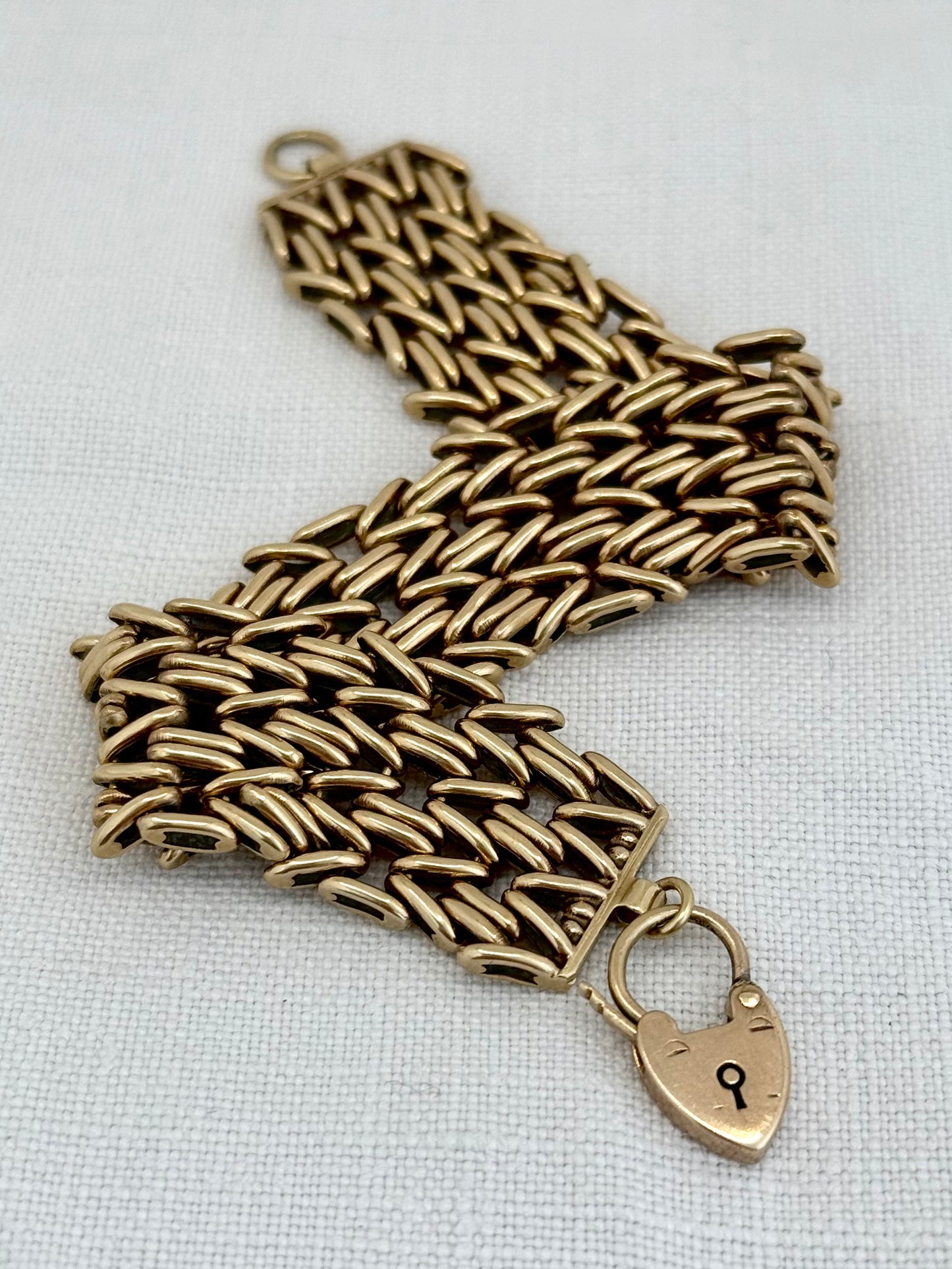 .1960 .1964 .375 9ct gold solid fancy link wide chunky width fancy link gate chain chain bracelet with gold heart padlock clasp