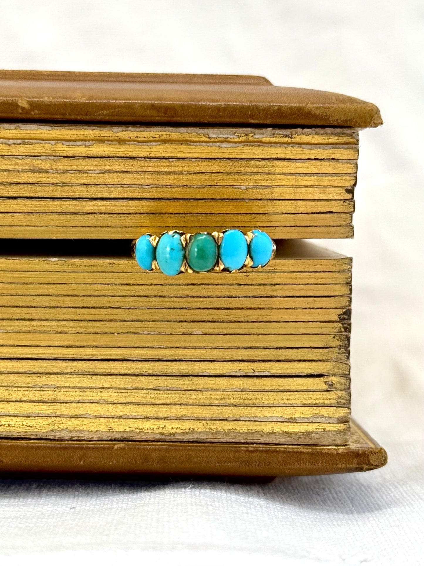 .18ct .1890s .5 turquoise Victorian blue gemstone half eternity high carat gold dress ring