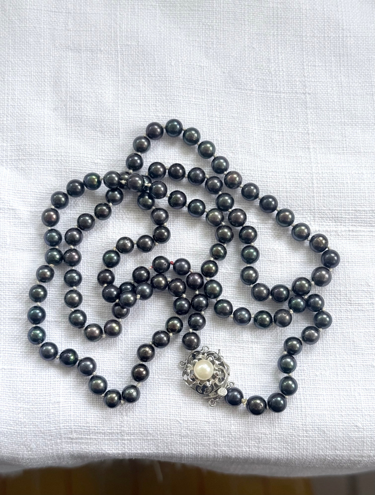 .925 .77.5cm long luxury cultured pearl real Tahitian purple petrol brown knotted Pearl necklace with floral sterling silver box clasp
