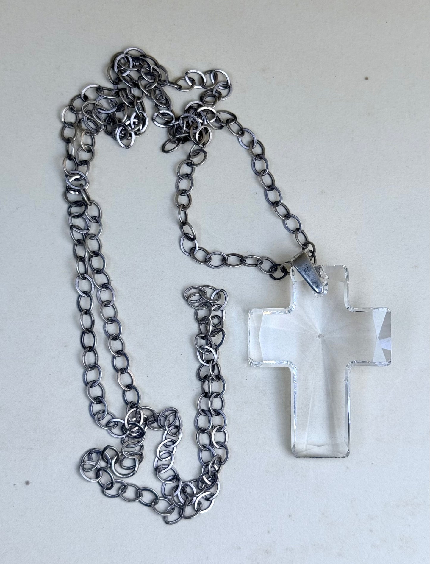 .925 .70cm long sterling silver modernist chain necklace with large faceted clear crystal glass cross pedant