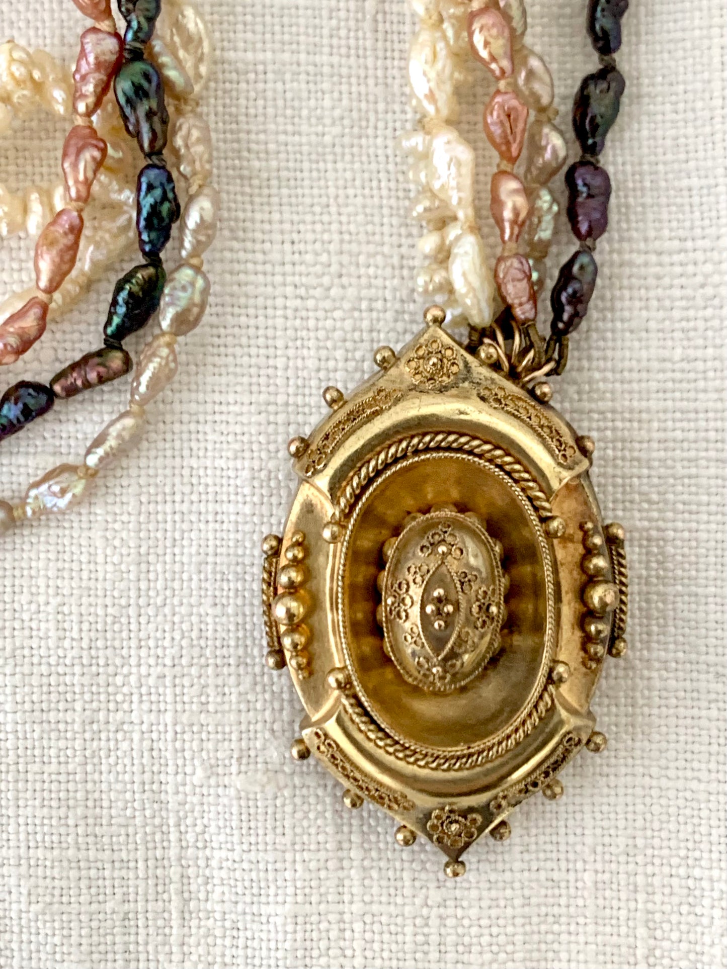 1800s 9ct gold Antique Etruscan revival Victorian yellow gold high detailed ornate oval pendant on dreamy shell coloured multi string 5 x string fresh water rice pearl necklace