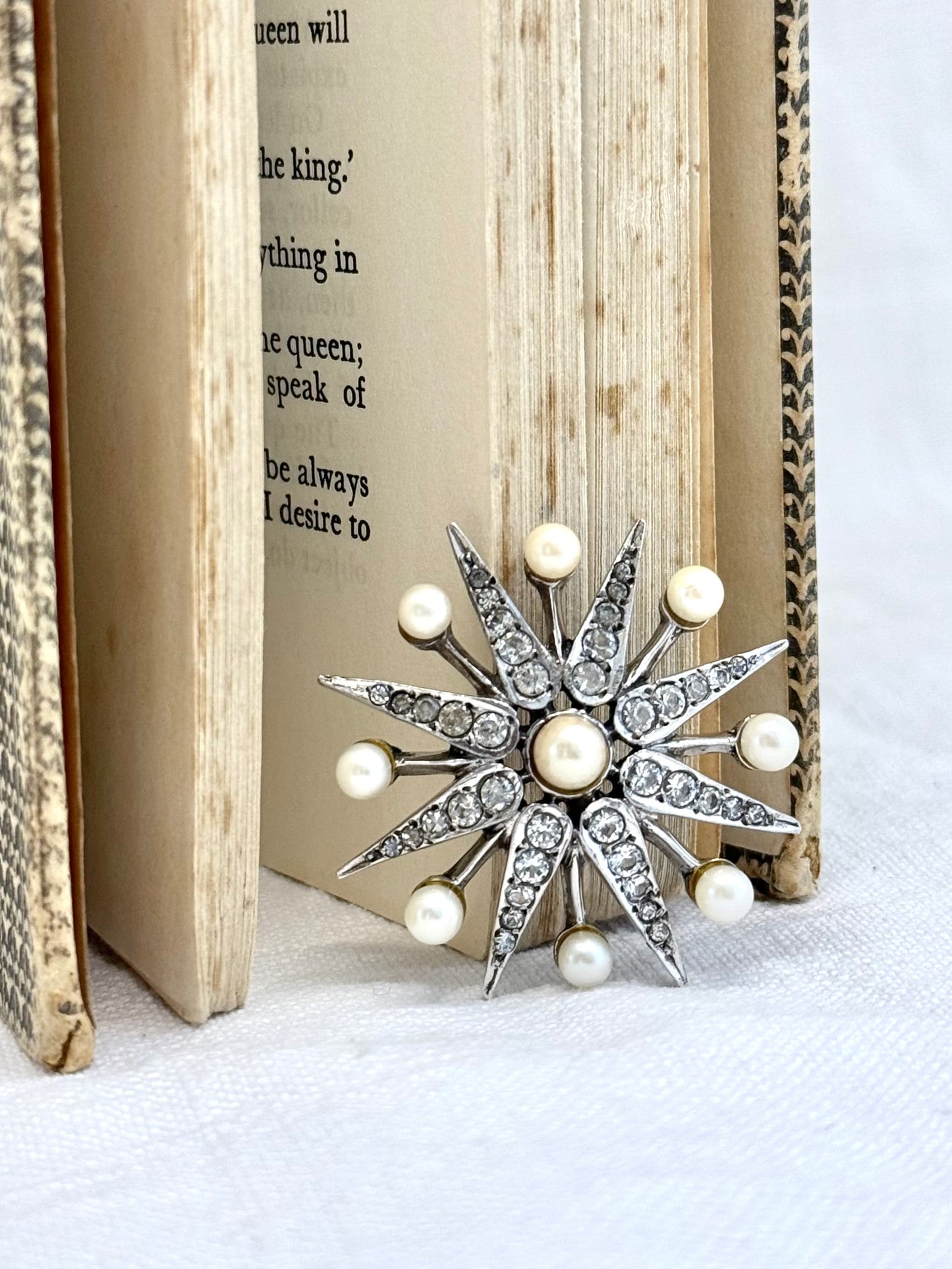 .1968 .925 Victorian revival 8 pointer sterling silver starburst star pendant with pearl and pave set diamanté gemstones