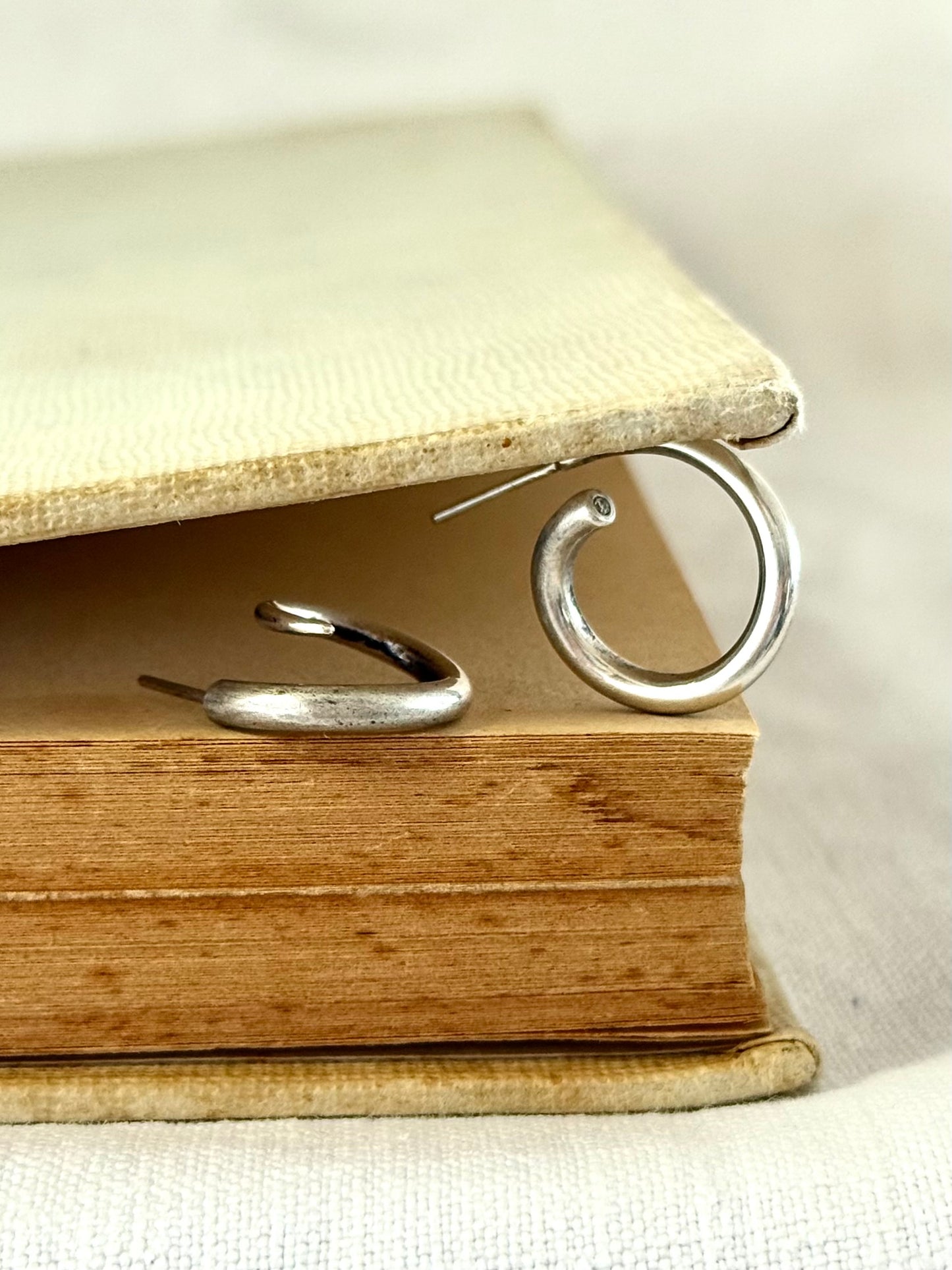 .925 silver diamond accent artisan made twist twirl mismatched wearable art solid silver luxury hoop post stud earrings