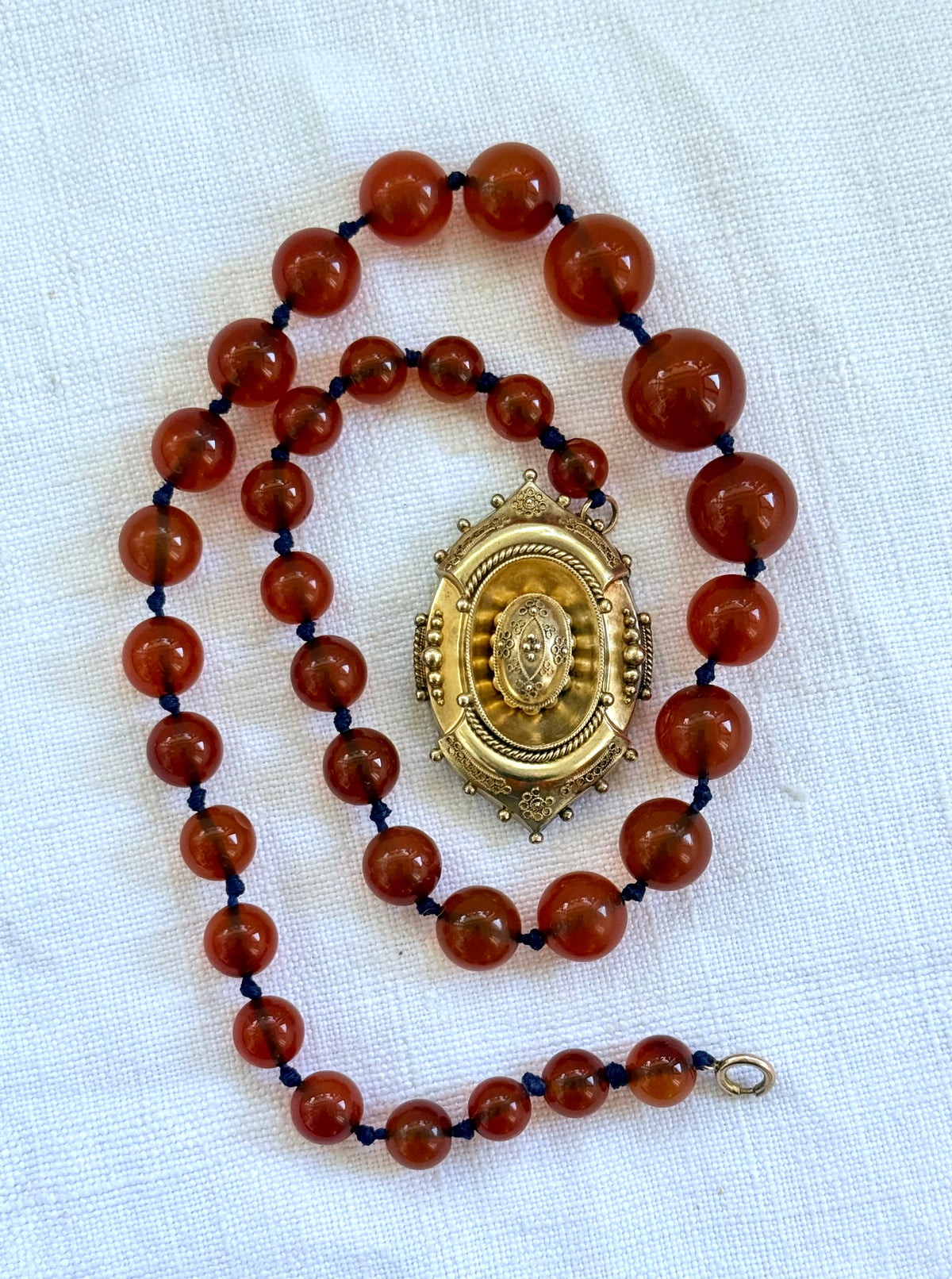 .1800s .375 .9ct gold Antique decorative fine Etruscan revival Victorian ornate gold oval pendant on luxury Carnelian bead graduated gemstone necklace setting