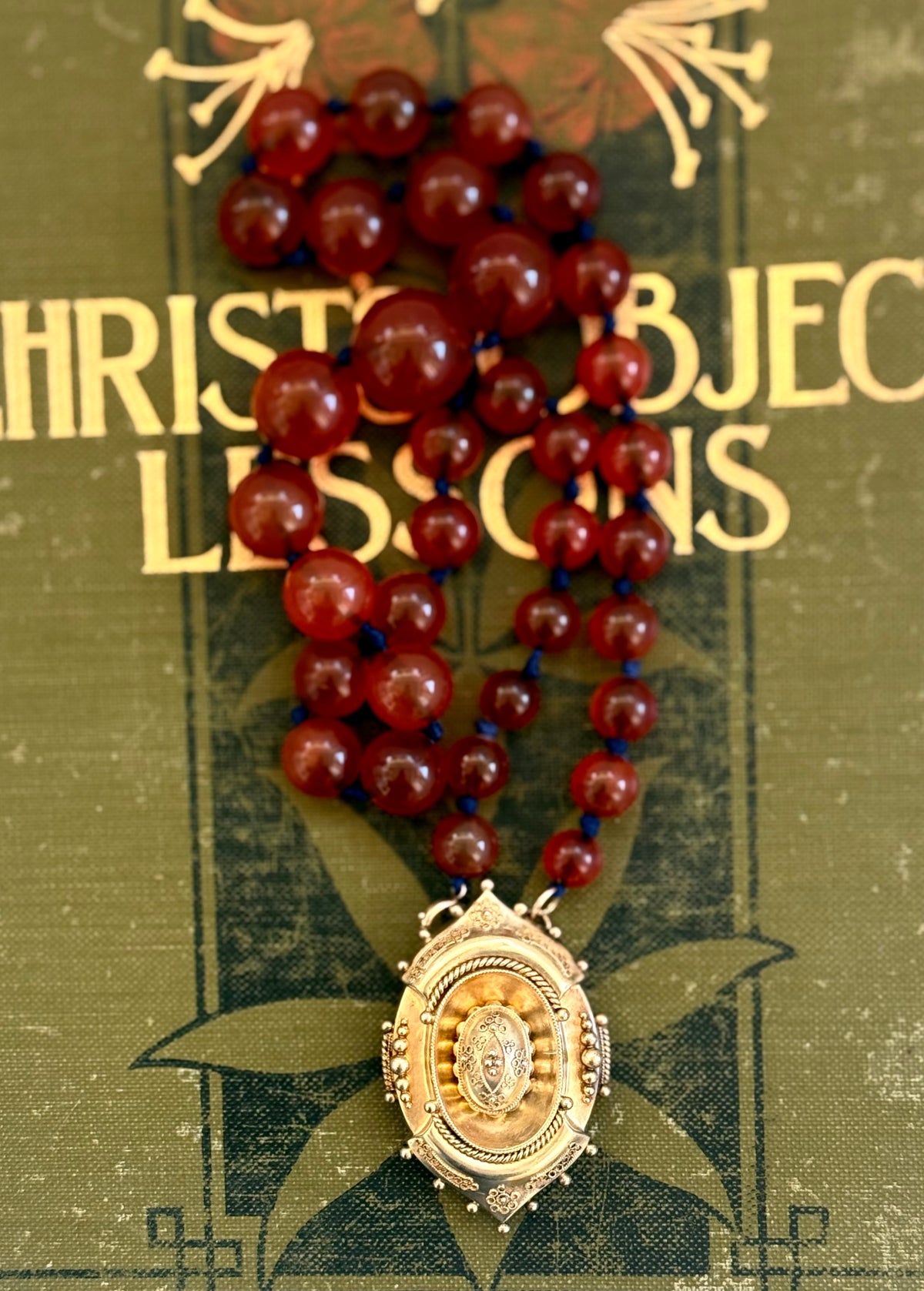 .1800s .375 .9ct gold Antique decorative fine Etruscan revival Victorian ornate gold oval pendant on luxury Carnelian bead graduated gemstone necklace setting