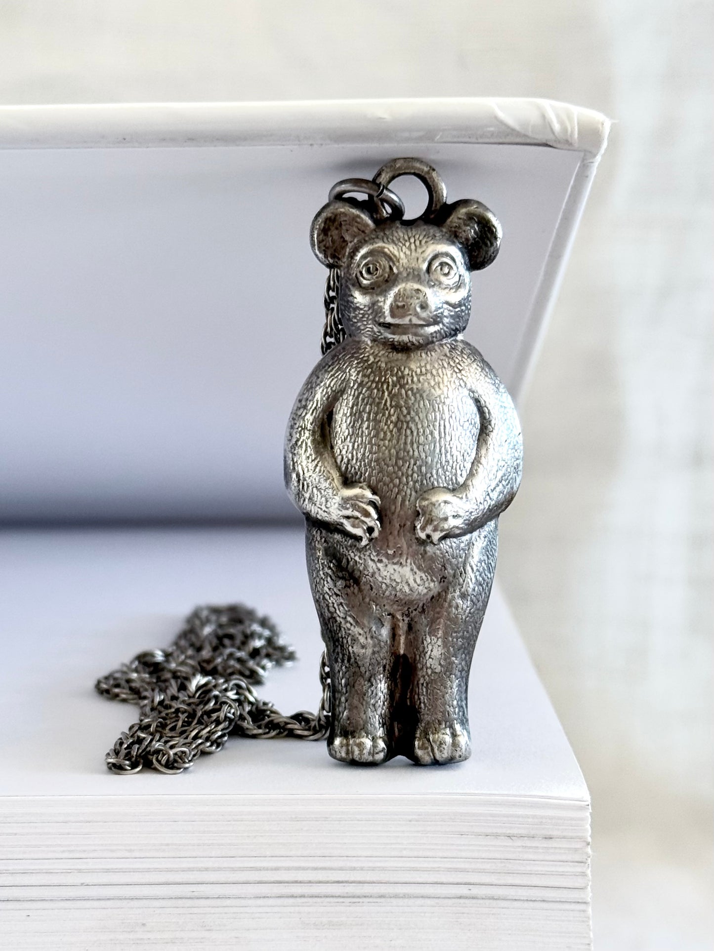 .1910s .1920s Art Nouveau figural collectors bear rattle baby rattle pendant on long silver chain