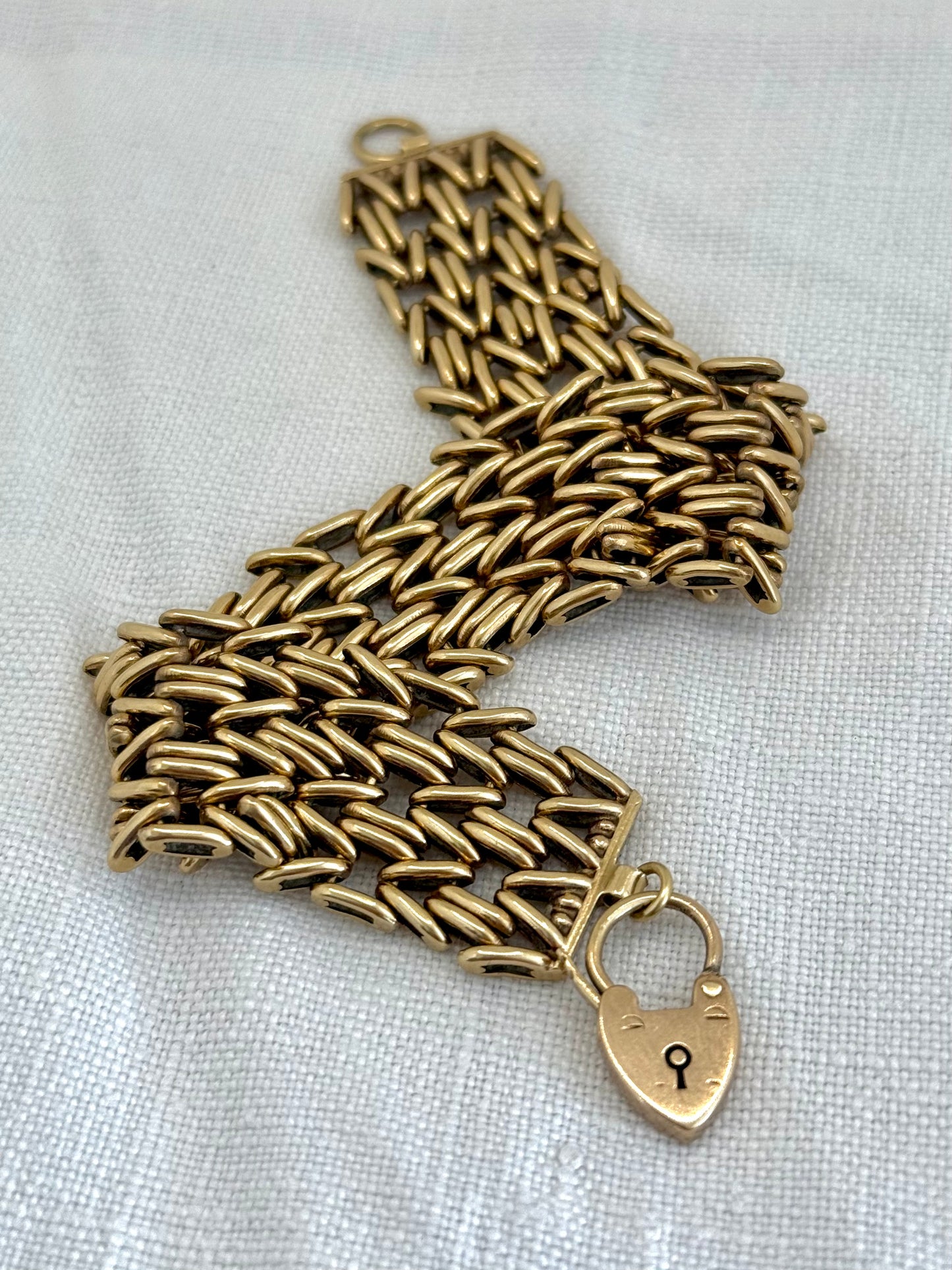 .1960 .1964 .375 9ct gold solid fancy link wide chunky width fancy link gate chain chain bracelet with gold heart padlock clasp