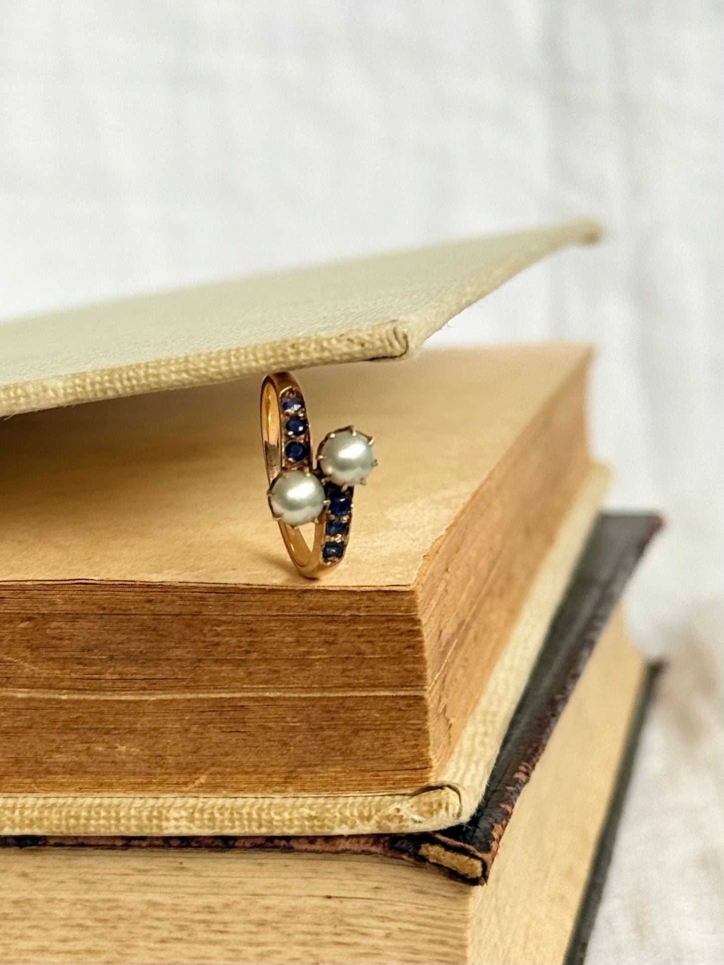 .14ct .1880s .1900s .585 gold antique Victorian Edwardian treasure Toi et Moi double pearl and sapphire bypass sweetheart commitment ring