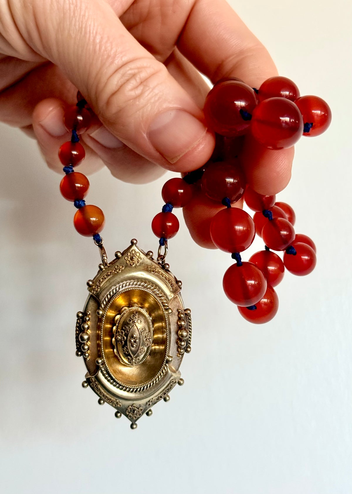 .1800s .375 .9ct gold Antique decorative fine Etruscan revival Victorian ornate gold oval pendant on luxury Carnelian bead graduated gemstone necklace setting