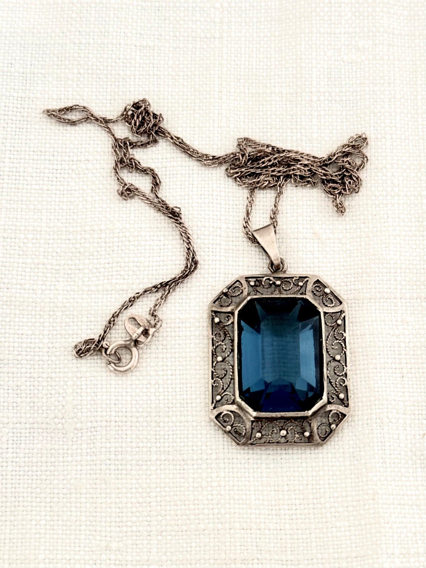 .1930s .1940s .925 silver late Art Deco Sapphire blue faceted paste gemstone pendant on silver chain