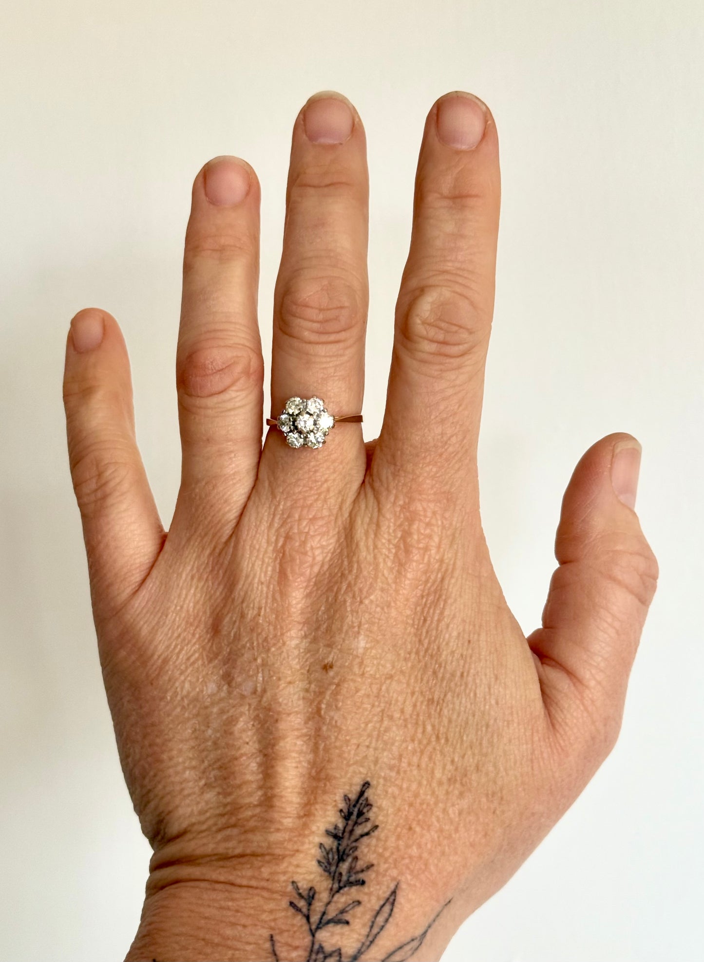 .18ct .1900s 1.00ct round brilliant antique floral cluster rosette high carat 750 yellow and white gold ring