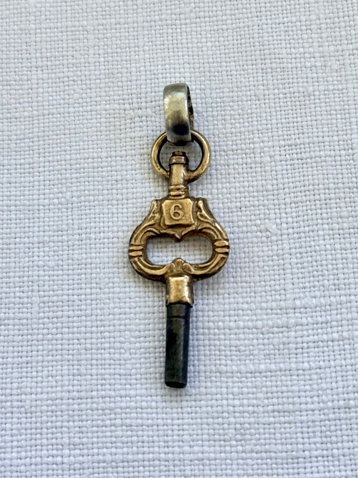 .1900s antique Art Nouveau brass watch winder key number 6 collectors silver fob pendant