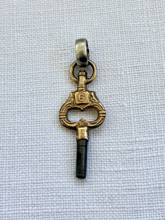 .1900s antique Art Nouveau brass watch winder key number 6 collectors silver fob pendant
