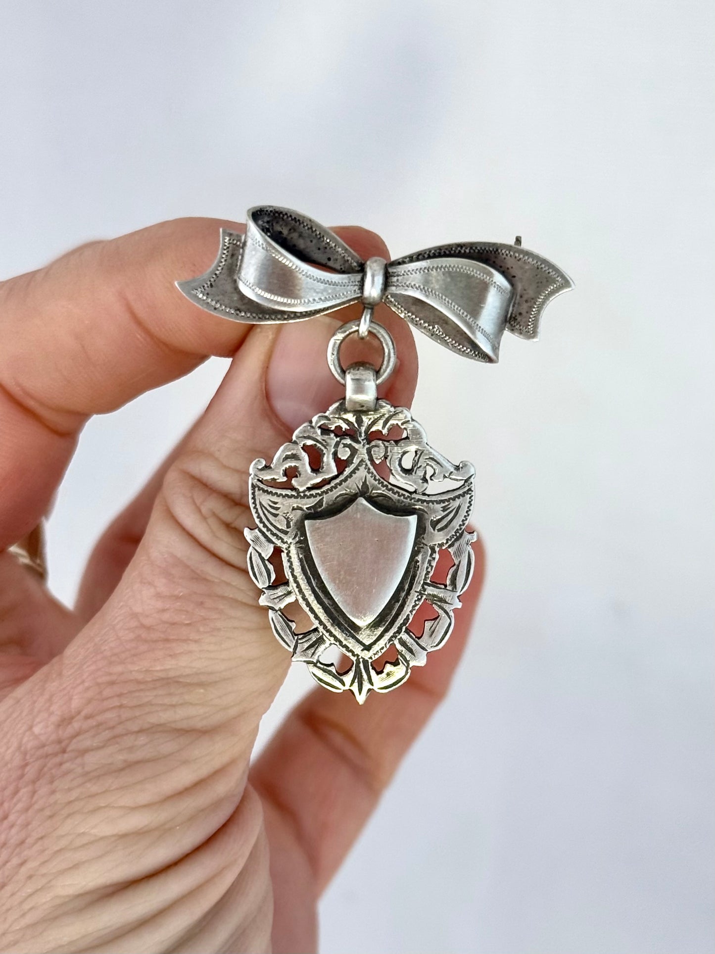 .1940s .1950s .925 Awards sterling silver Sweetheart bow and fob medallion brooch