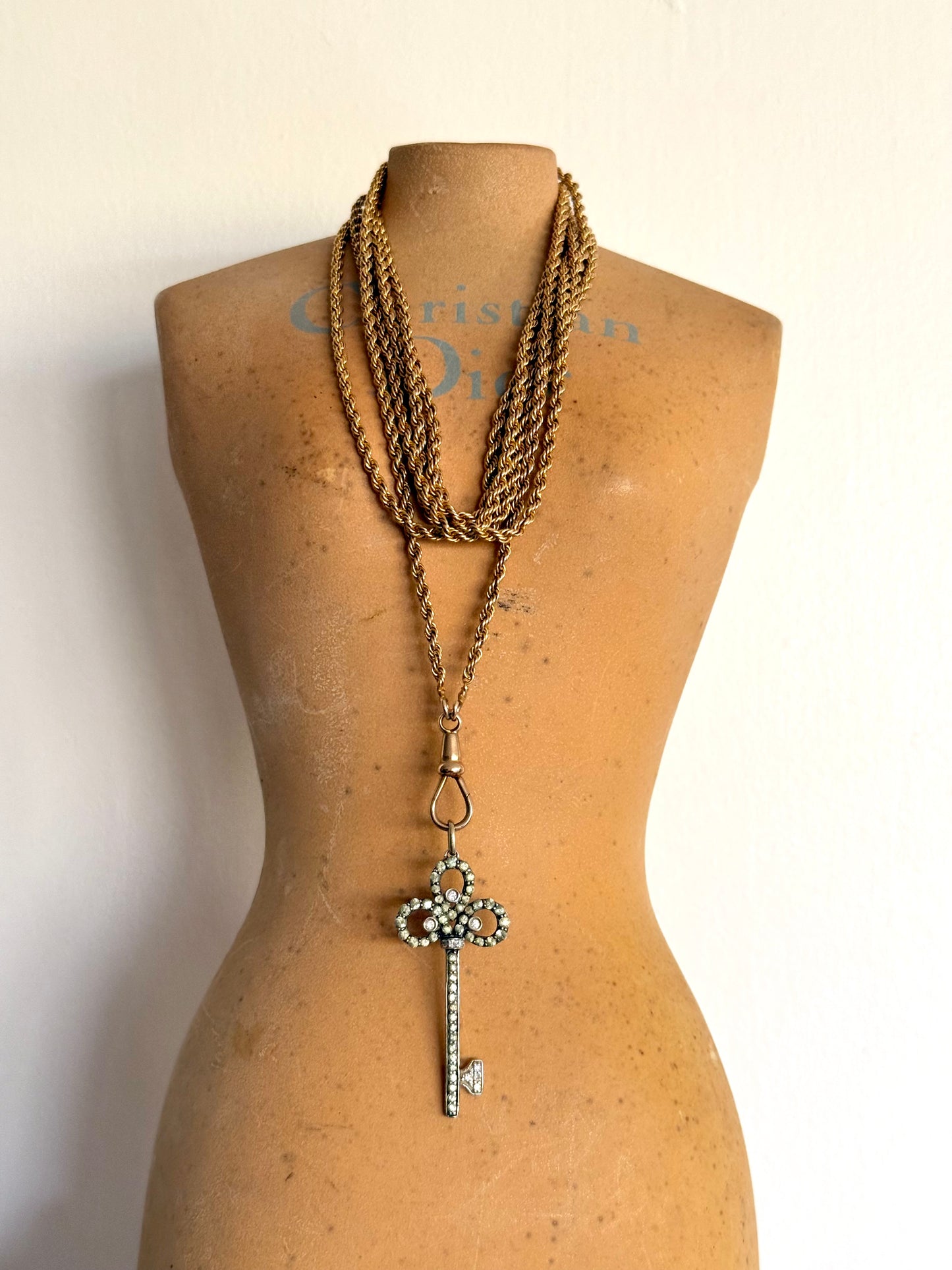 .18ct .750 .60 diamonds Brazilian designer white gold antique revival modernist diamond key luxury 18ct high carat gold and diamond studded romantic clover leaf key pendant