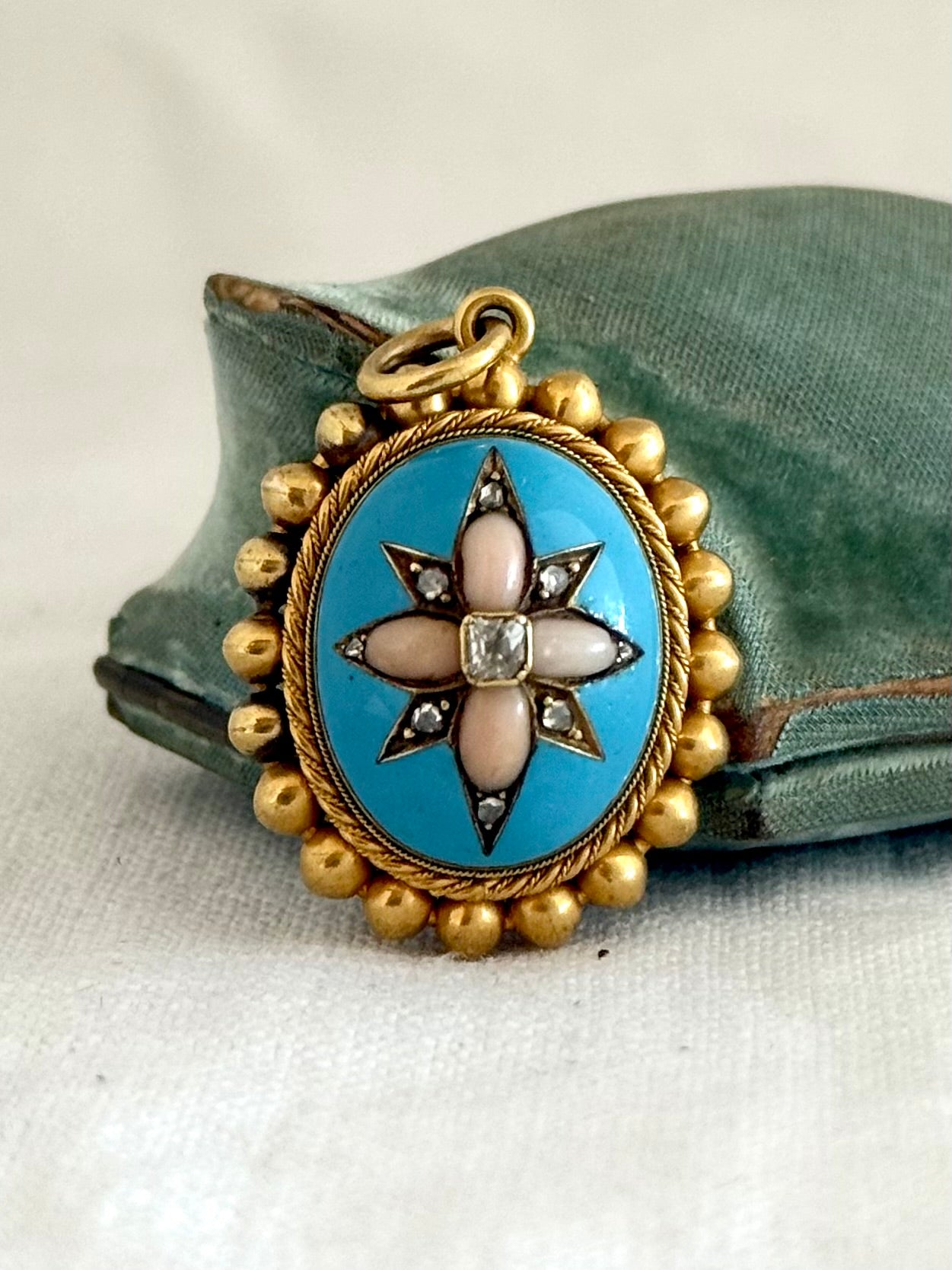 .15ct .1850s .1860s antique Victorian Yellow Gold Cushion cut Diamond Rose Cut Diamond star starburst Angel Coral and Blue Enamel Etruscan Revival Beaded border Mourning locket pendant
