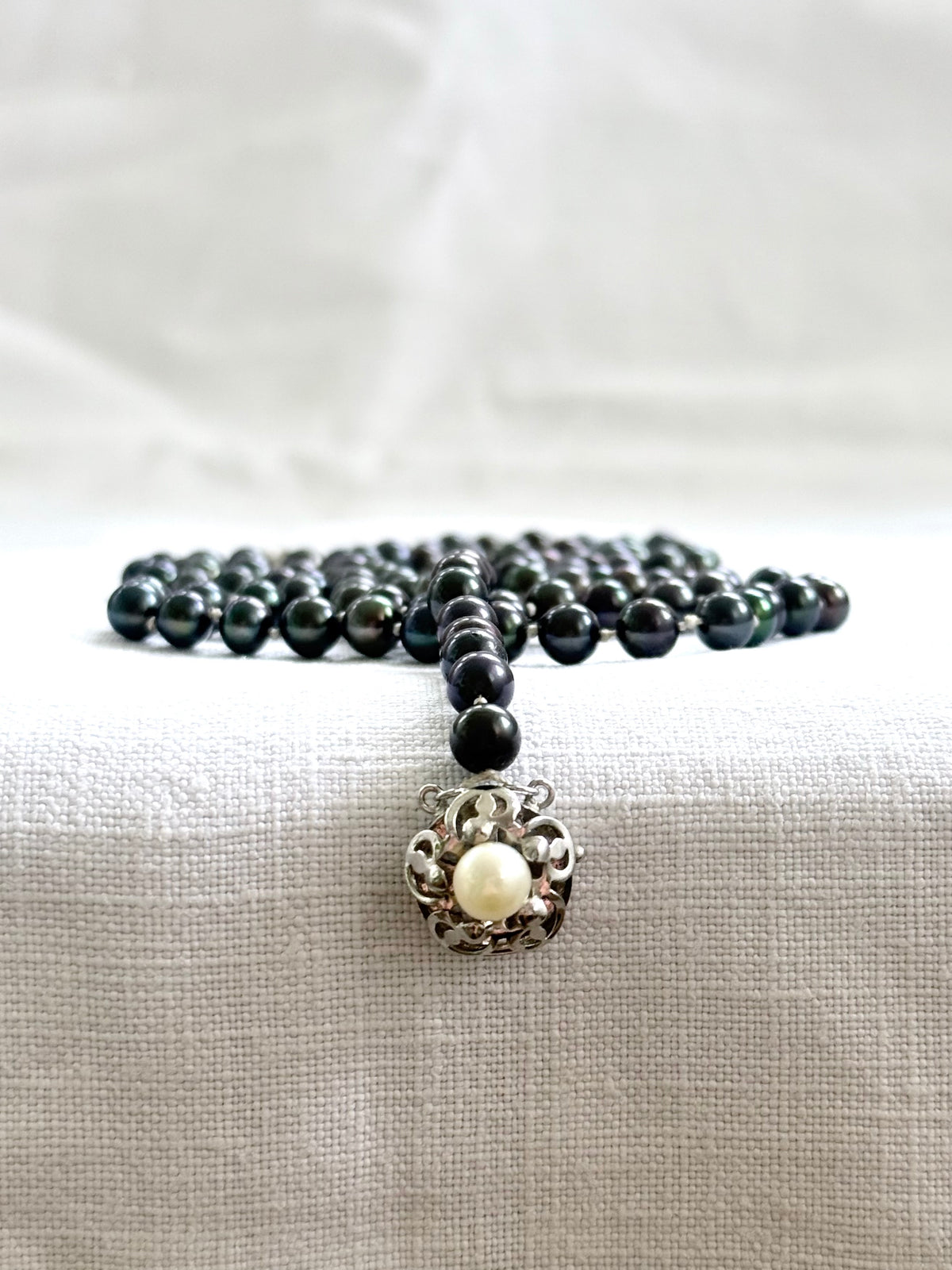 .925 .77.5cm long luxury cultured pearl real Tahitian purple petrol brown knotted Pearl necklace with floral sterling silver box clasp
