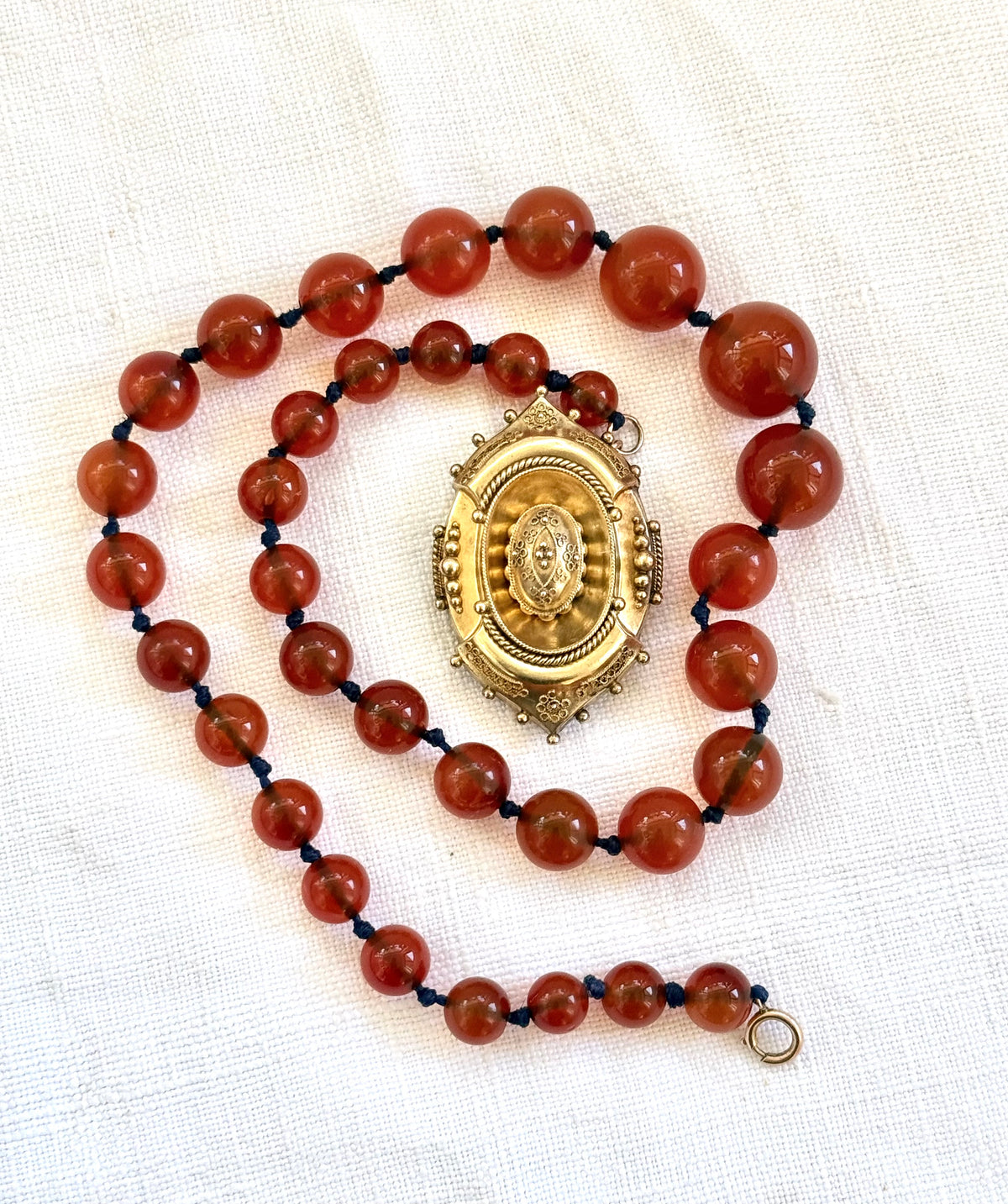 .1800s .375 .9ct gold Antique decorative fine Etruscan revival Victorian ornate gold oval pendant on luxury Carnelian bead graduated gemstone necklace setting