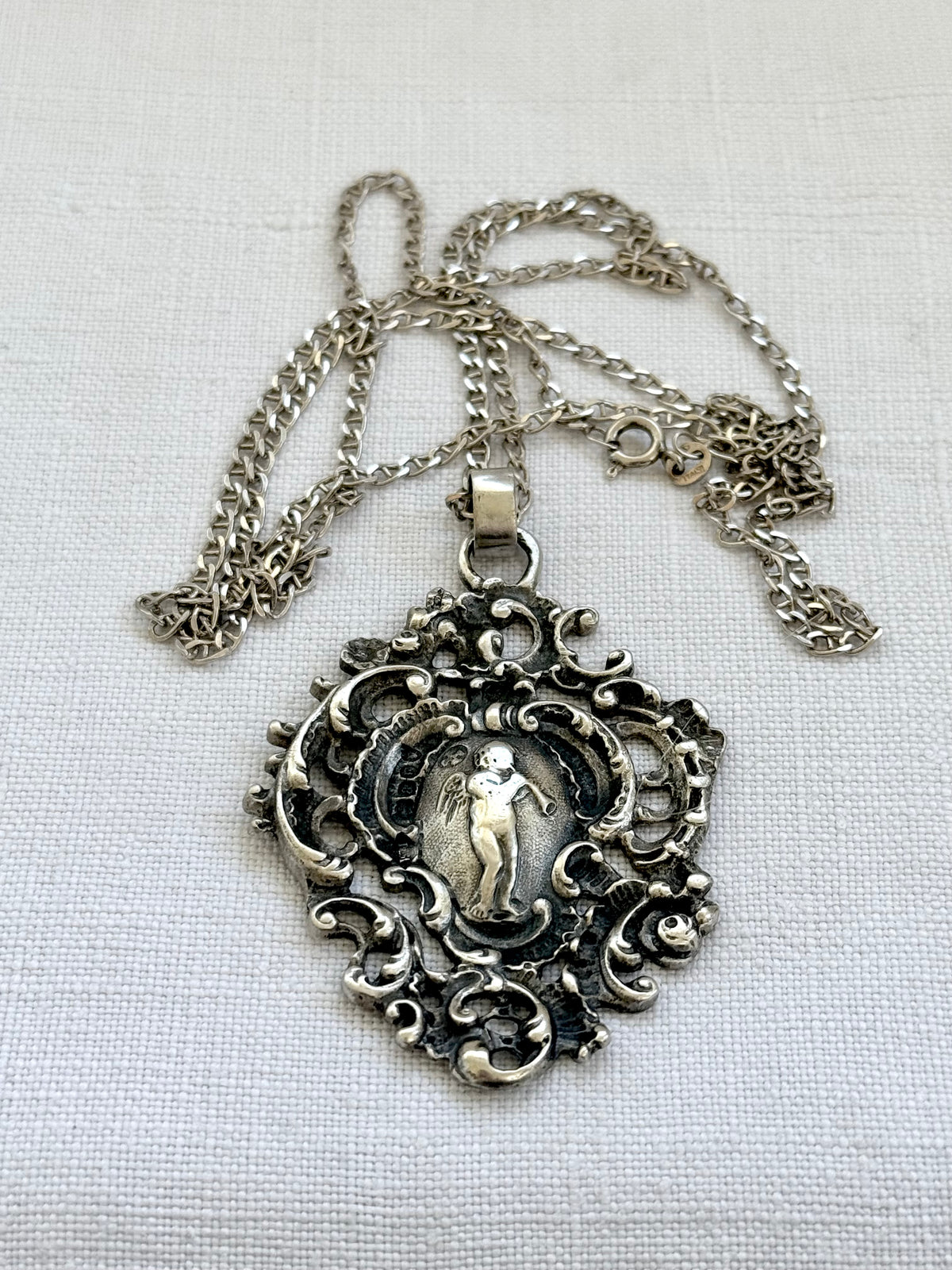 .1896 .925 antique Baroque revival right facing angel trumpet playing cherub filigree large sterling silver Victorian hallmarked silver pendant
