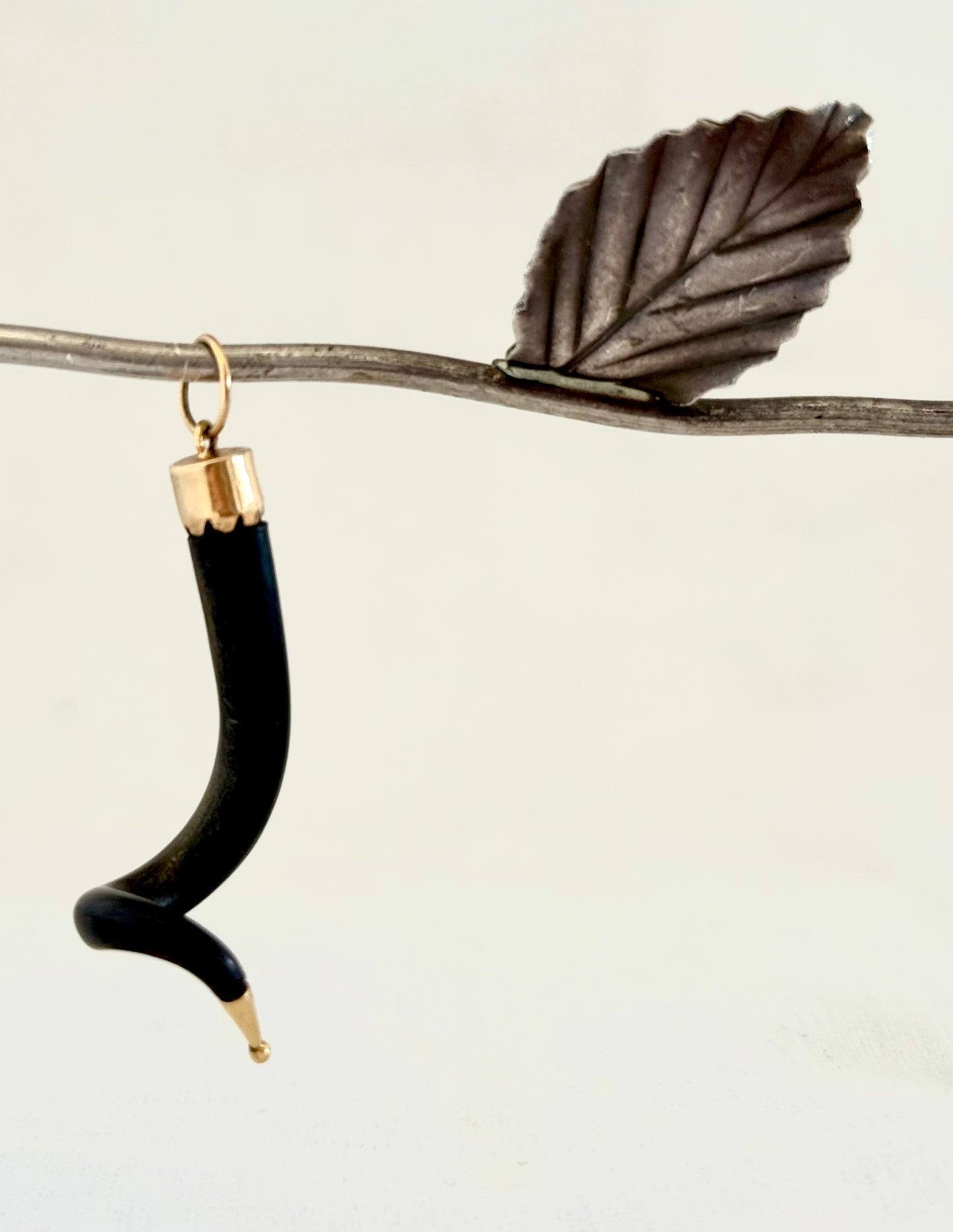 .14ct .1880s .1920s .585 gold and natural spiral twist horn amulet pendant