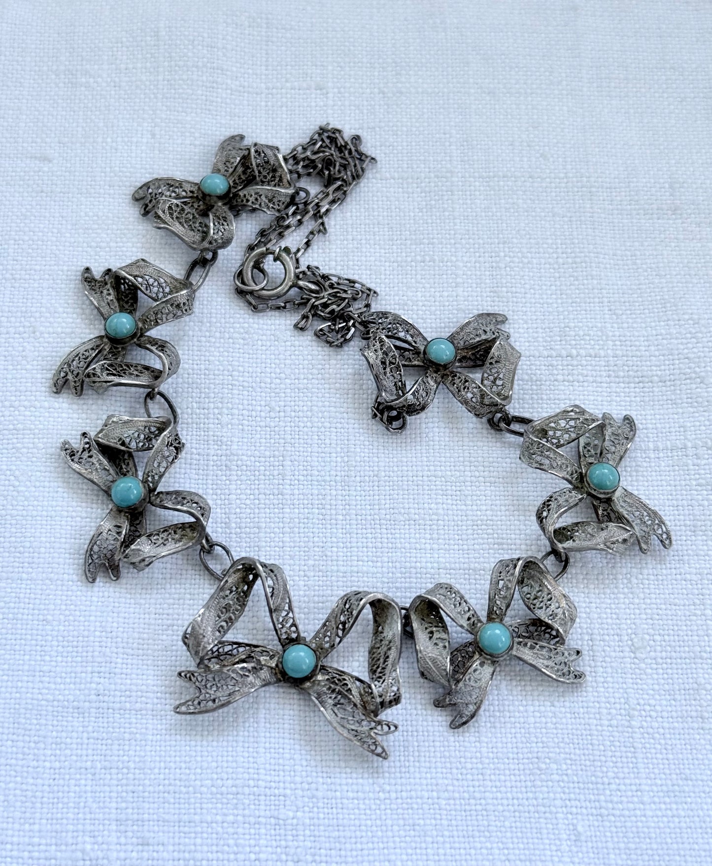 .1900s .1930s .916 silver vintage open work filigree wirework Bow Ribbon chain necklace