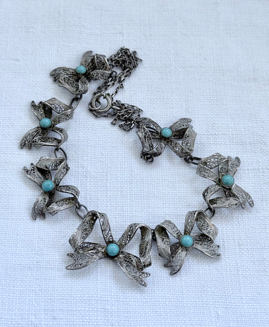 .1900s .1930s .916 silver vintage open work filigree wirework Bow Ribbon chain necklace