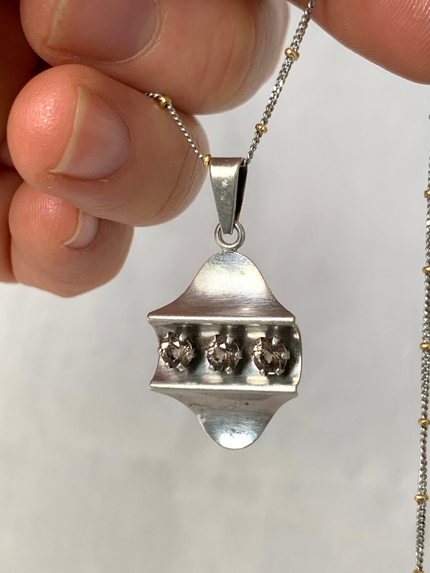 .925 1960s Elis Kauppi Kupittaan Kulta Finland solid silver modernist Smoky Smokey Quartz gemstone geometric Finish MCM designer pendant.