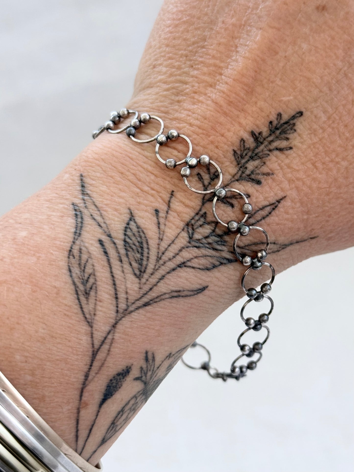 .21cm .925 articulated circular circle modernist silver link chain bracelet